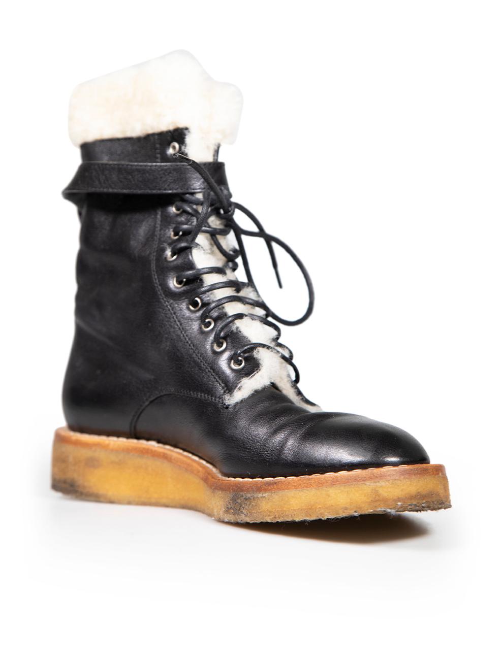 CONDITION is Good. Minor wear to boots is evident. Light wear to both boot rubber outsoles with dark marks to the rubber on this used Céline designer resale item. These boots come with original dust bag.
 
 Details
 Black
 Leather
 Biker boots
