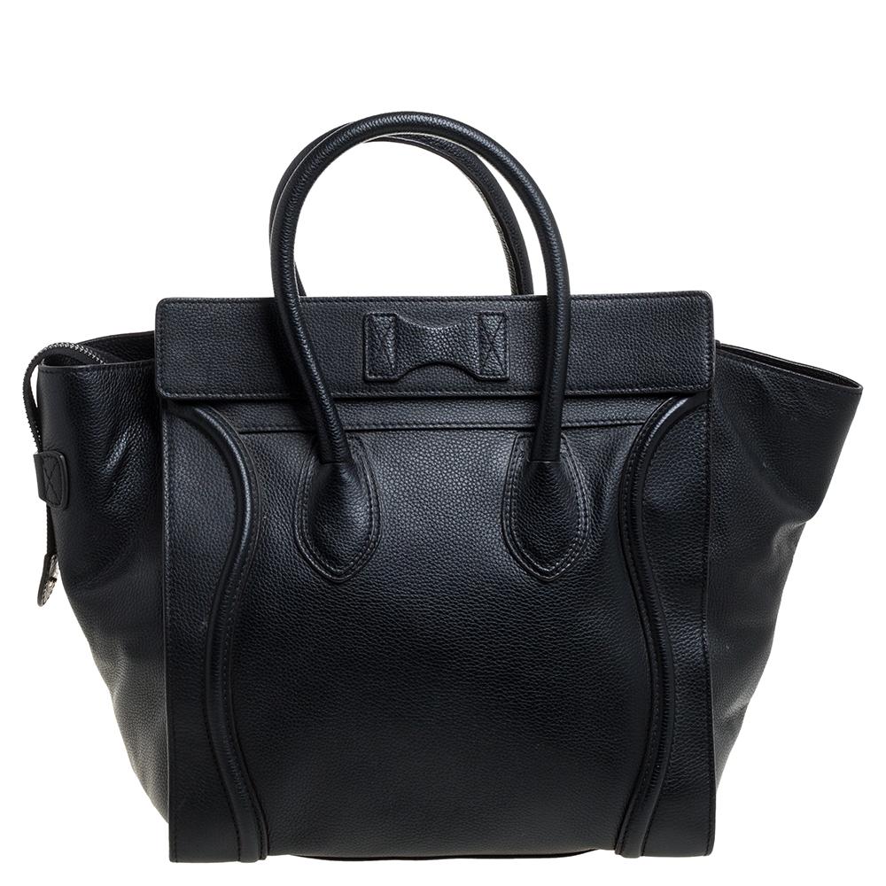 The mini Luggage tote from Celine is one of the most popular handbags in the world. This tote is crafted from leather and designed in a black shade. It comes with rolled top handles, a detachable shoulder strap and a front zip pocket. The bag is