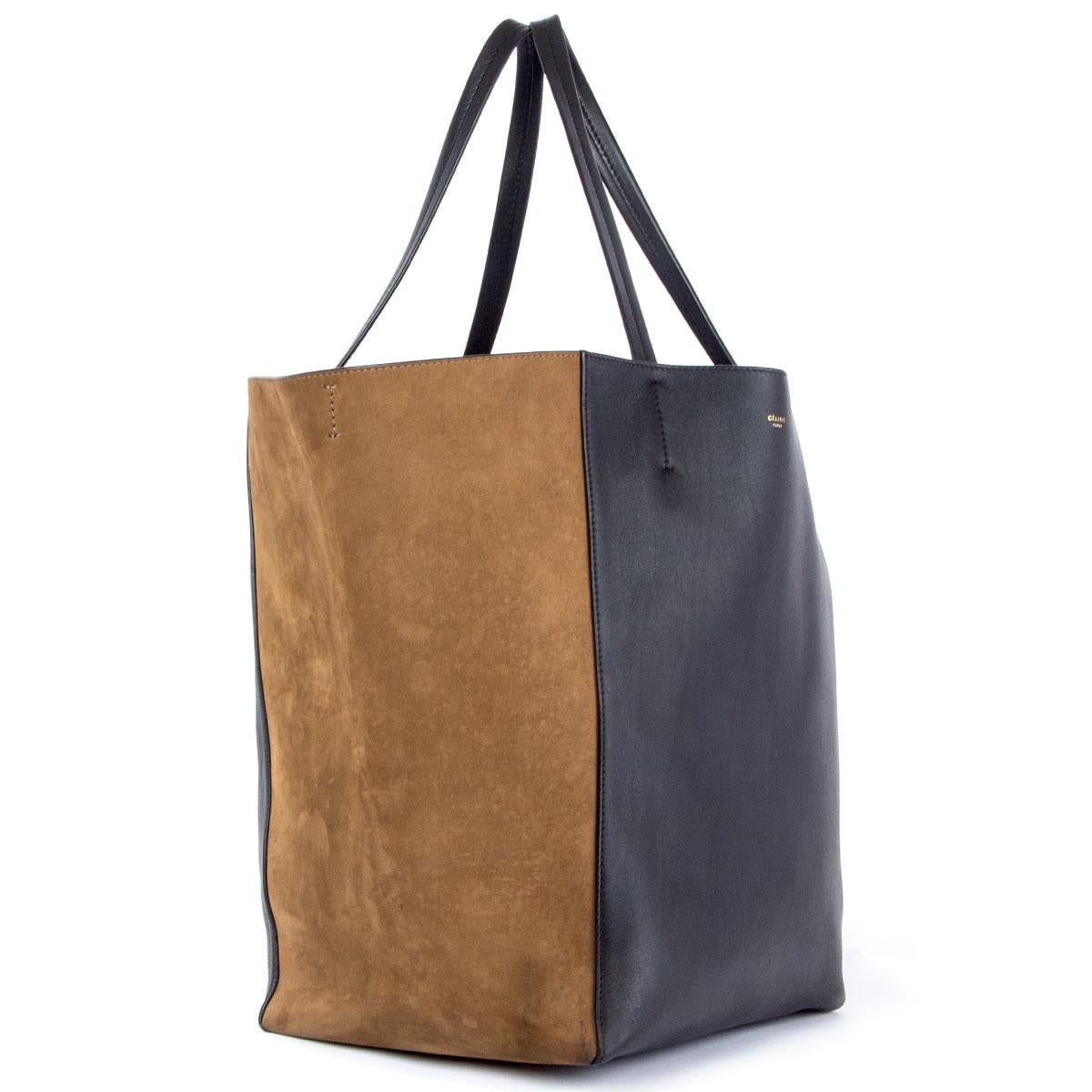 100% authentic Céline Horizontal Cabas Phantom Medium tote bag in black calfskin and olive green nubuck leather. Lined in black calfskin with one zipper pocket against the back and two open pockets on top. Comes with a detachable black calfskin