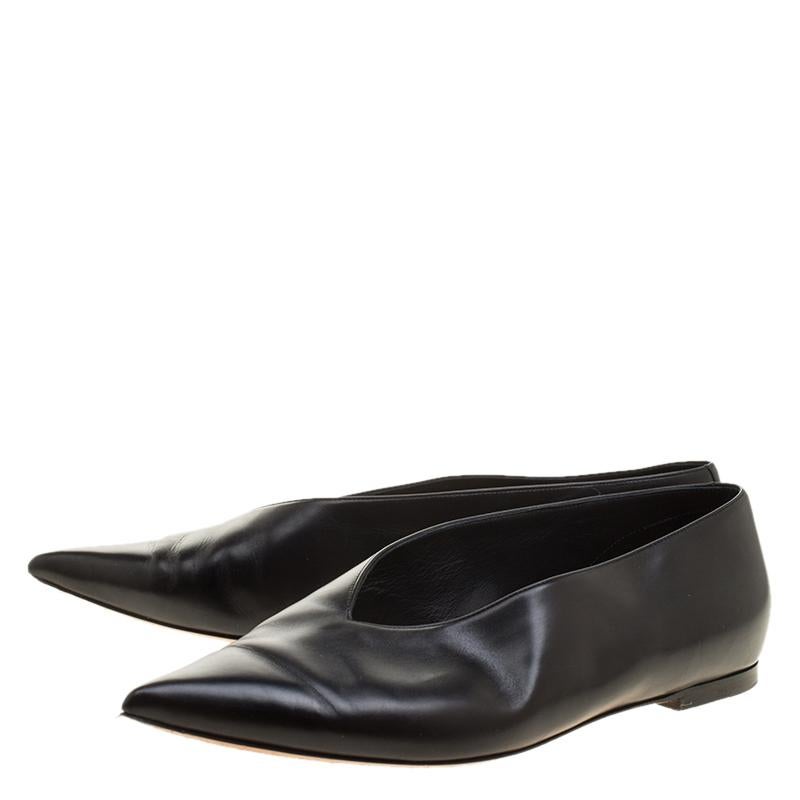Wear sophistication with a touch of high fashion by choosing these subtle flats from Celine. These black leather flats flaunt pointed toes and will complement your formal ensembles with the most effortless style.

Includes: The Luxury Closet