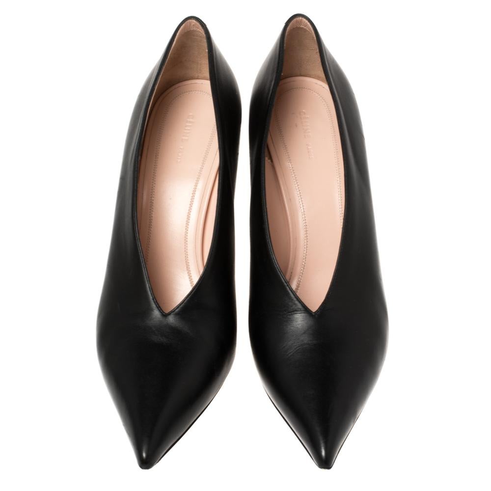 Simplicity and sophistication take center stage in these black pumps from Celine! They have been crafted from leather and feature a V-neck silhouette with pointed toes. They come equipped with comfortable leather-lined insoles and stand tall on 9.5
