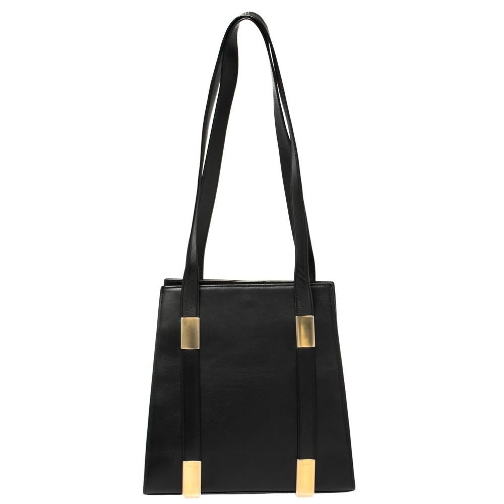 Celine has been at the forefront of luxury fashion and getting your hands on one of its vintage pieces is a miracle indeed. This tote bag has an old-world charm with a functional design sense that makes it perfect for a modern-day woman's wardrobe.