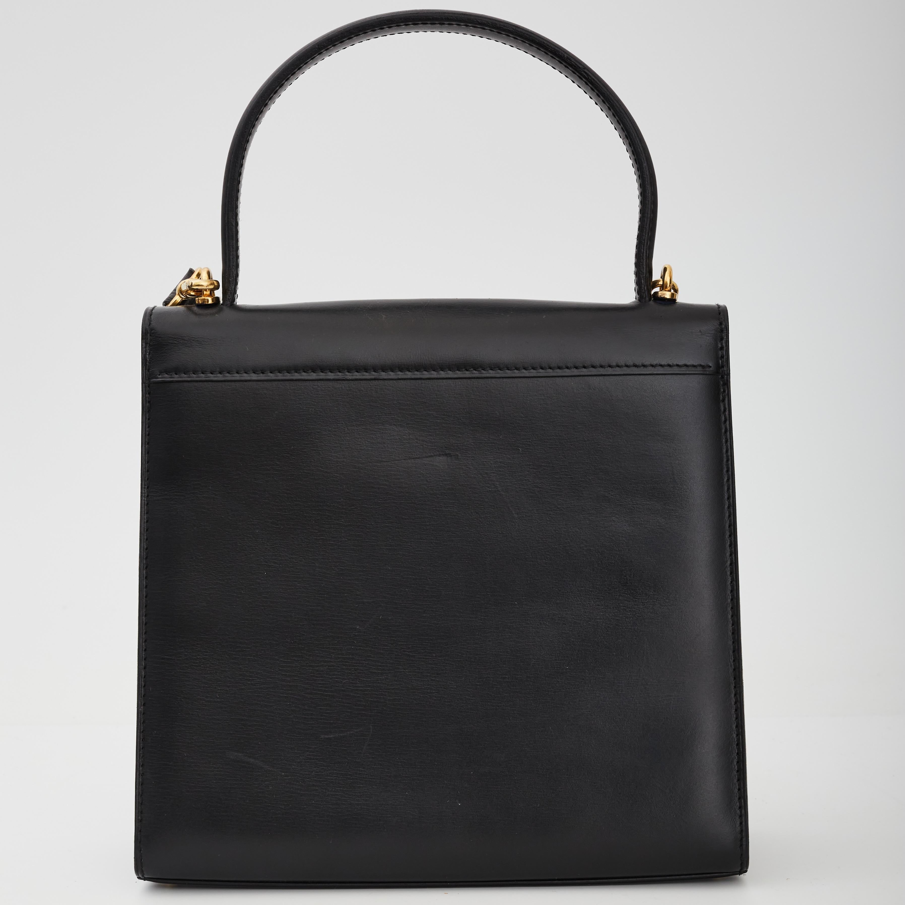 COLOR: Black
MATERIAL: Calfskin
MEASURES: H 9” x L 9.25” x D 3.25”
DROP: 6” (top handle) & 17.5 (shoulder strap)
CONDITION: Very good - light indentations, marks, scratches to exterior and interior leather. The bag was professionally dyed. 

Made in