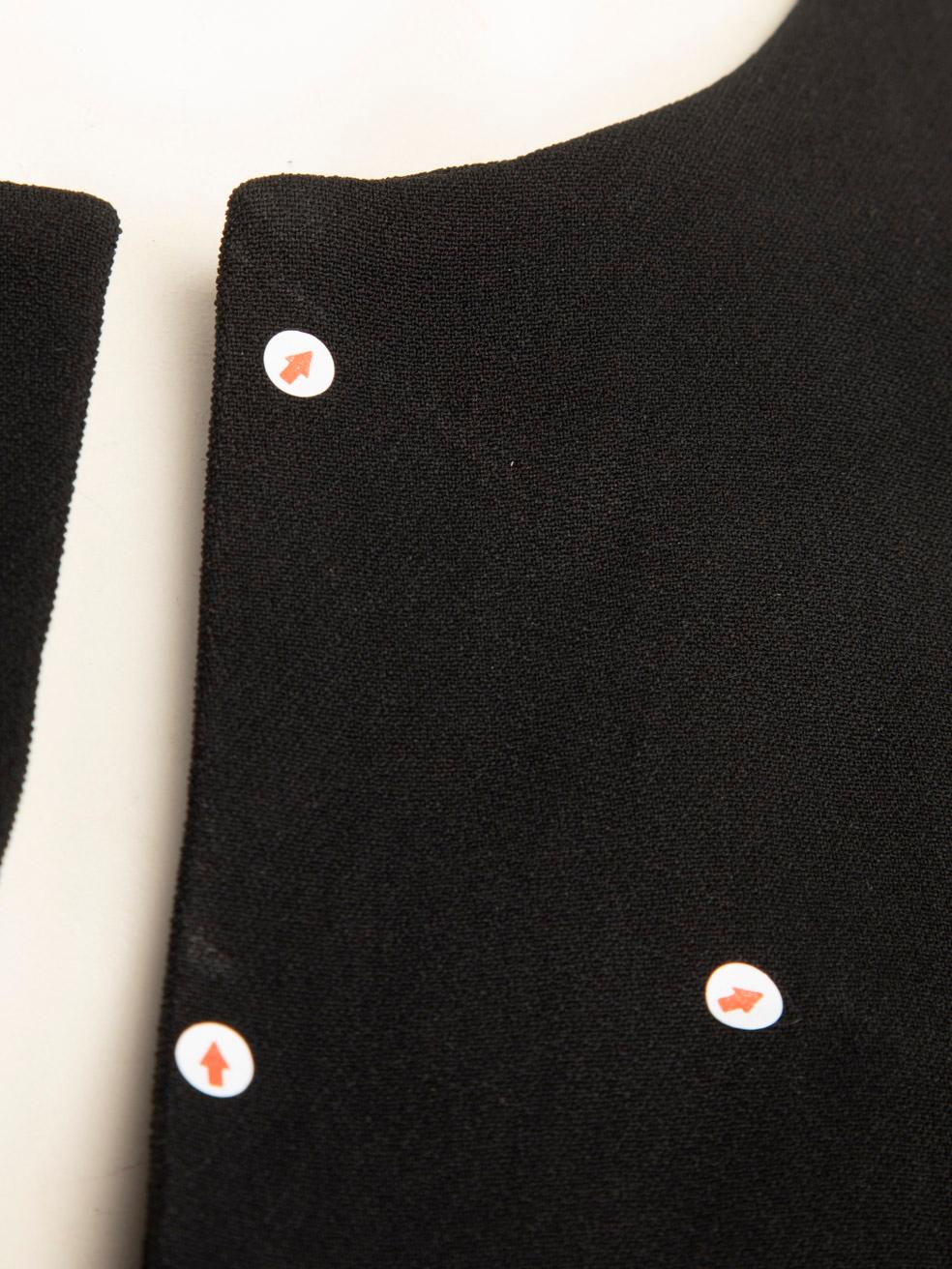 Mini robe à péplum noire Céline Taille L en vente 1