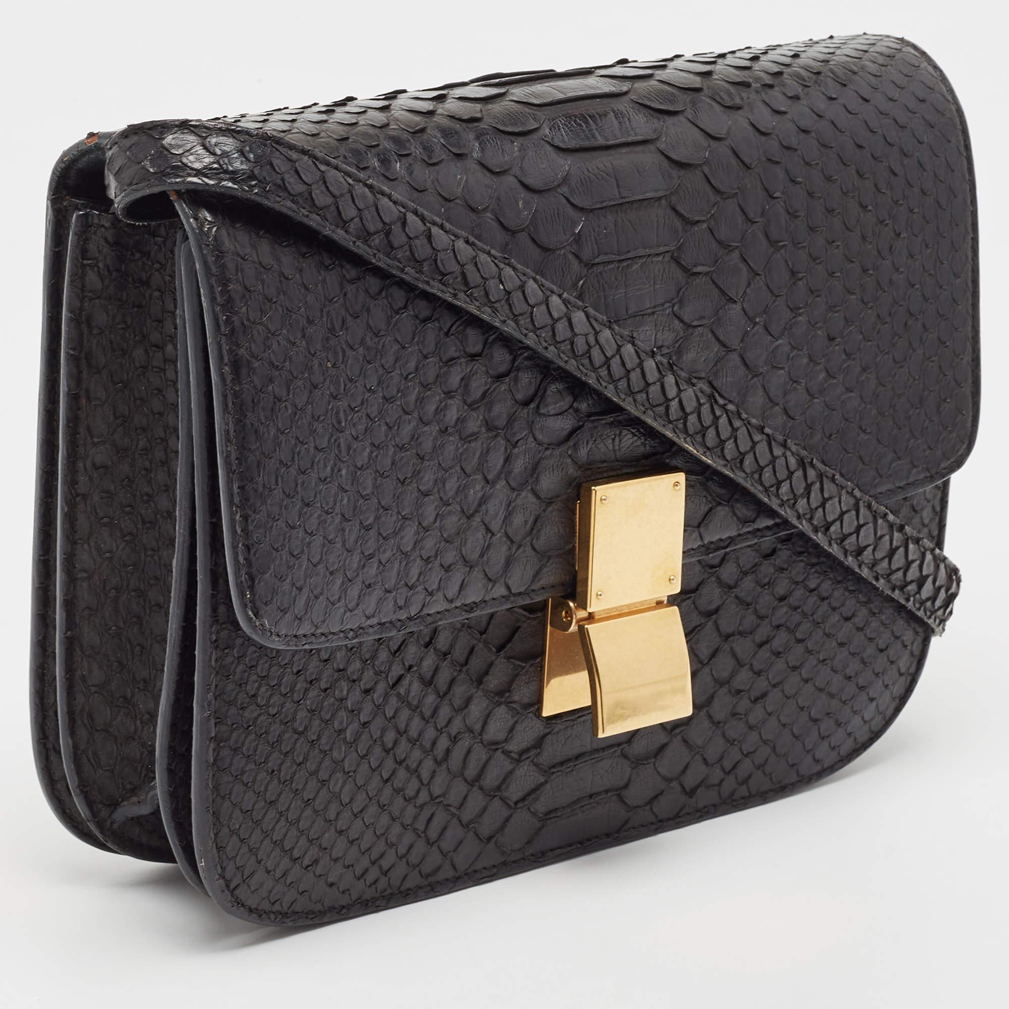 From the house of Celine comes this gorgeous Classic Box flap bag that will perfectly complement all your outfits. It has been luxuriously crafted from python and styled with a flap that opens to a well-sized leather interior. It is a timeless