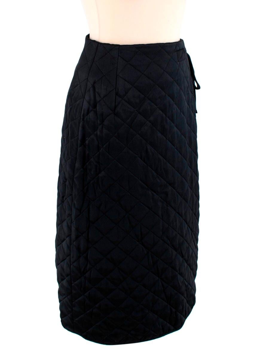  Celine Black Quilted Satin Pencil Skirt

- Concealed zip closure on the side
- Self-tie bow detail on the side
- Diamond quilted design

Materials:
54% Acetate
46% Polyester

Made in France
Dry clean only

PLEASE NOTE, THESE ITEMS ARE PRE-OWNED AND