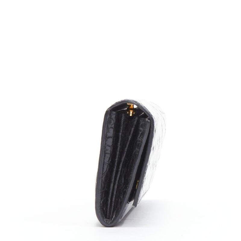 Black CELINE black scaled leather embossed calfskin flap front long wallet For Sale