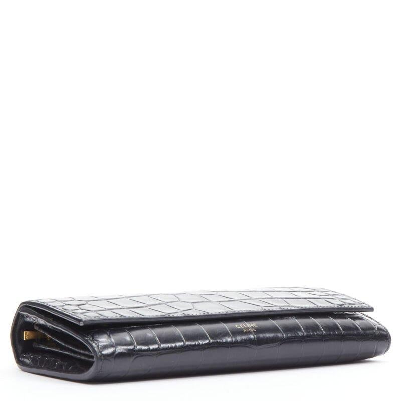 Women's CELINE black scaled leather embossed calfskin flap front long wallet For Sale