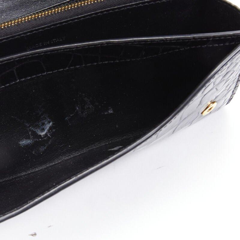 CELINE black scaled leather embossed calfskin flap front long wallet For Sale 2