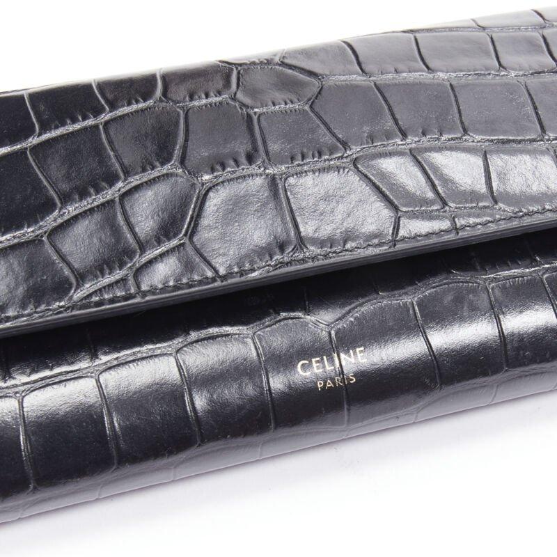 CELINE black scaled leather embossed calfskin flap front long wallet For Sale 4