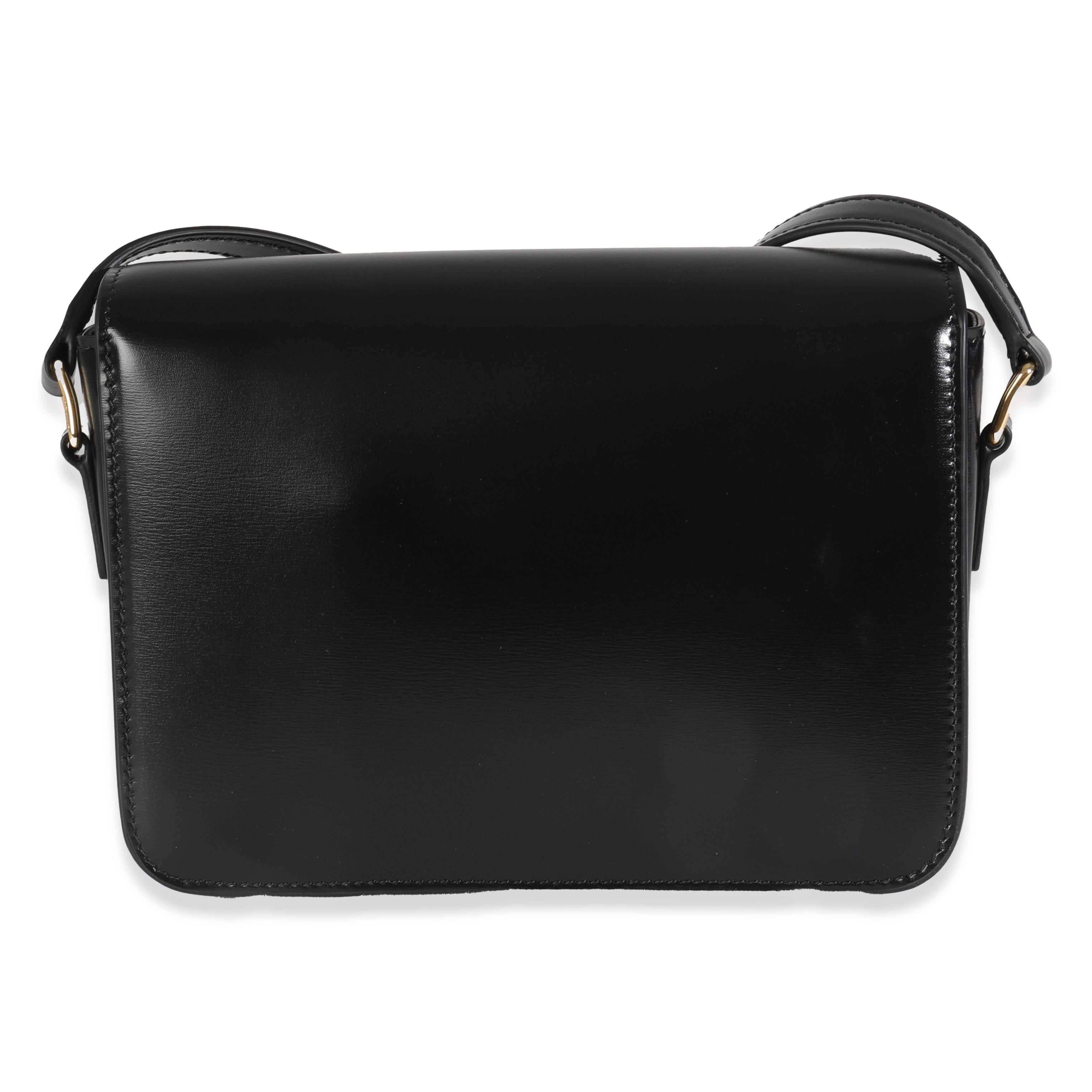 Listing Title: Celine Black Shiny Calfskin Teen Triomphe
SKU: 144922
MSRP: 3950.00 USD
Condition: Pre-owned 
Handbag Condition: Pristine
Condition Comments: Item has no indication of wear.  Final sale.
Brand: Celine
Model: Teen Triomphe
Origin