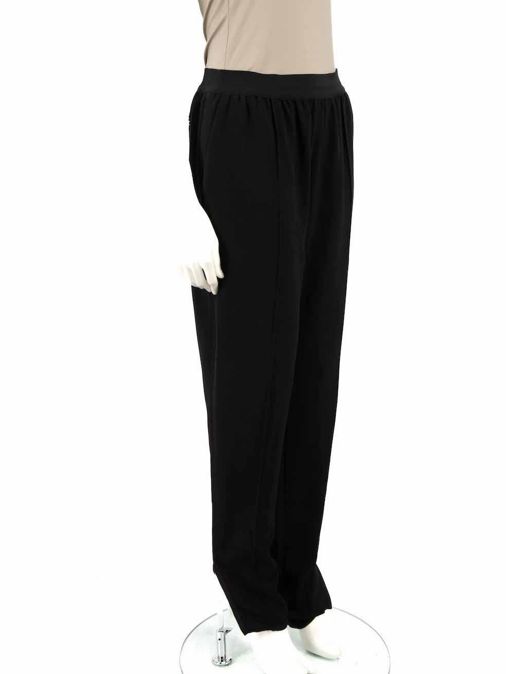 CONDITION is Very good. Minimal wear to trousers is evident. Minimal wear to both cuffs have become un-tacked from the lining on this used Céline designer resale item.
 
 
 
 Details
 
 
 Black
 
 Viscose
 
 Tapered trousers
 
 High rise
 
