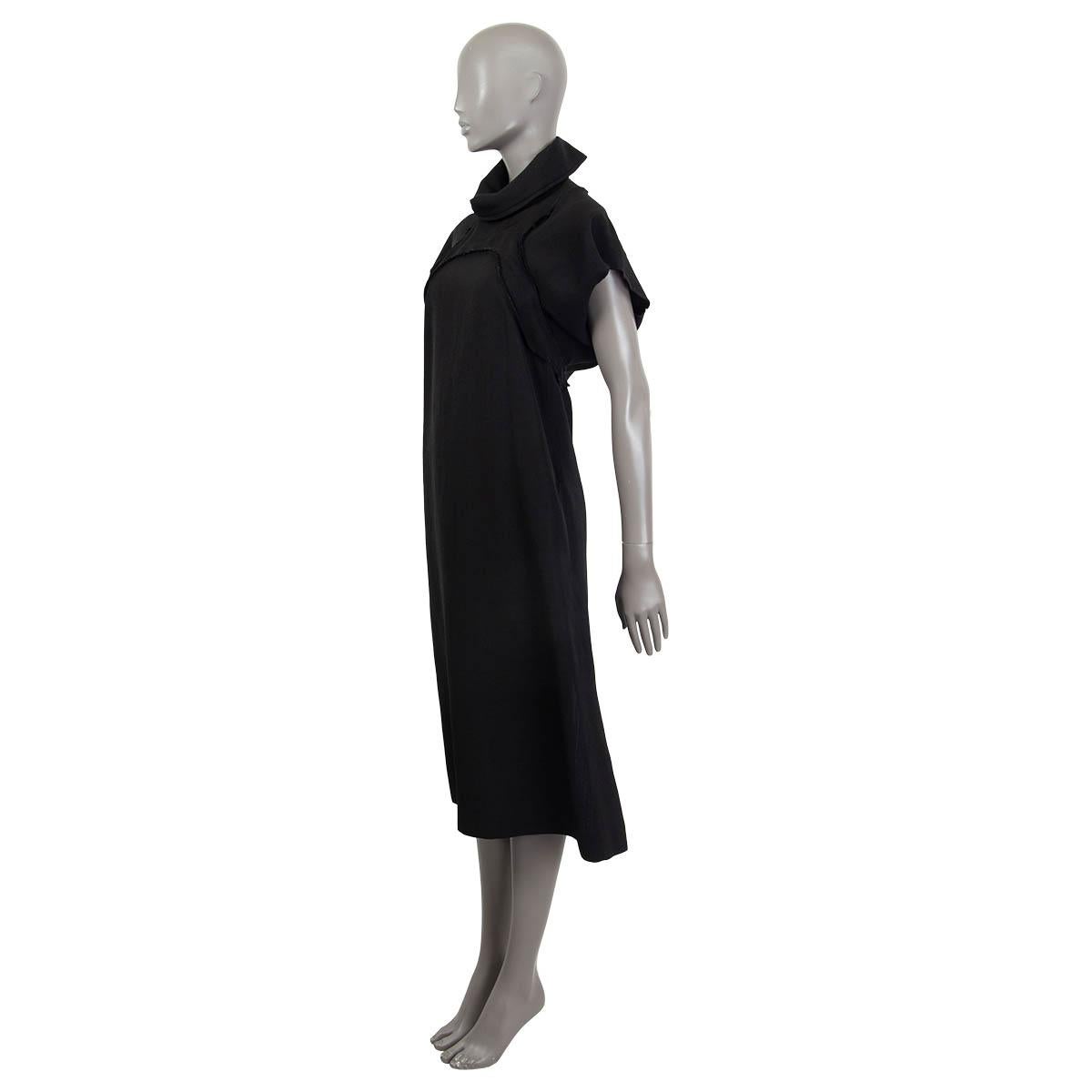 100% authentic Céline by Phoebe Philo shift dress in black viscose (57%) and silk (43%). Features a high rise draped collar and deconstructed details. Has two slit pockets at the sides and a slit on the back. Opens with a concealed zipper and a hook