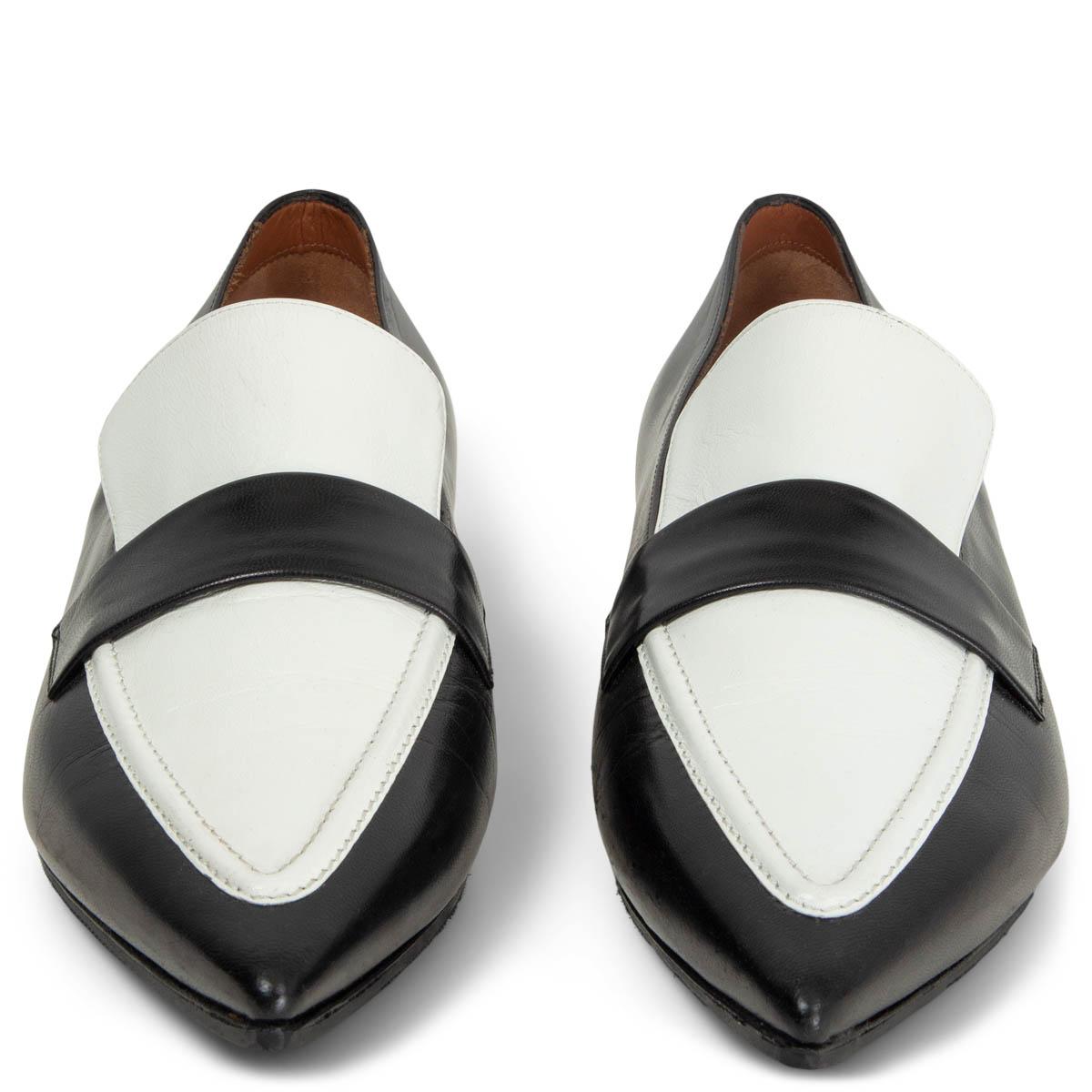 100% authentic Céline pointed-toe loafers in black and white smooth calfskin. Have been worn once or twice and are in excellent condition. Rubber sole has been added. 

Measurements
Imprinted Size	41
Shoe Size	41
Inside Sole	27cm (10.5in)
Width	8cm