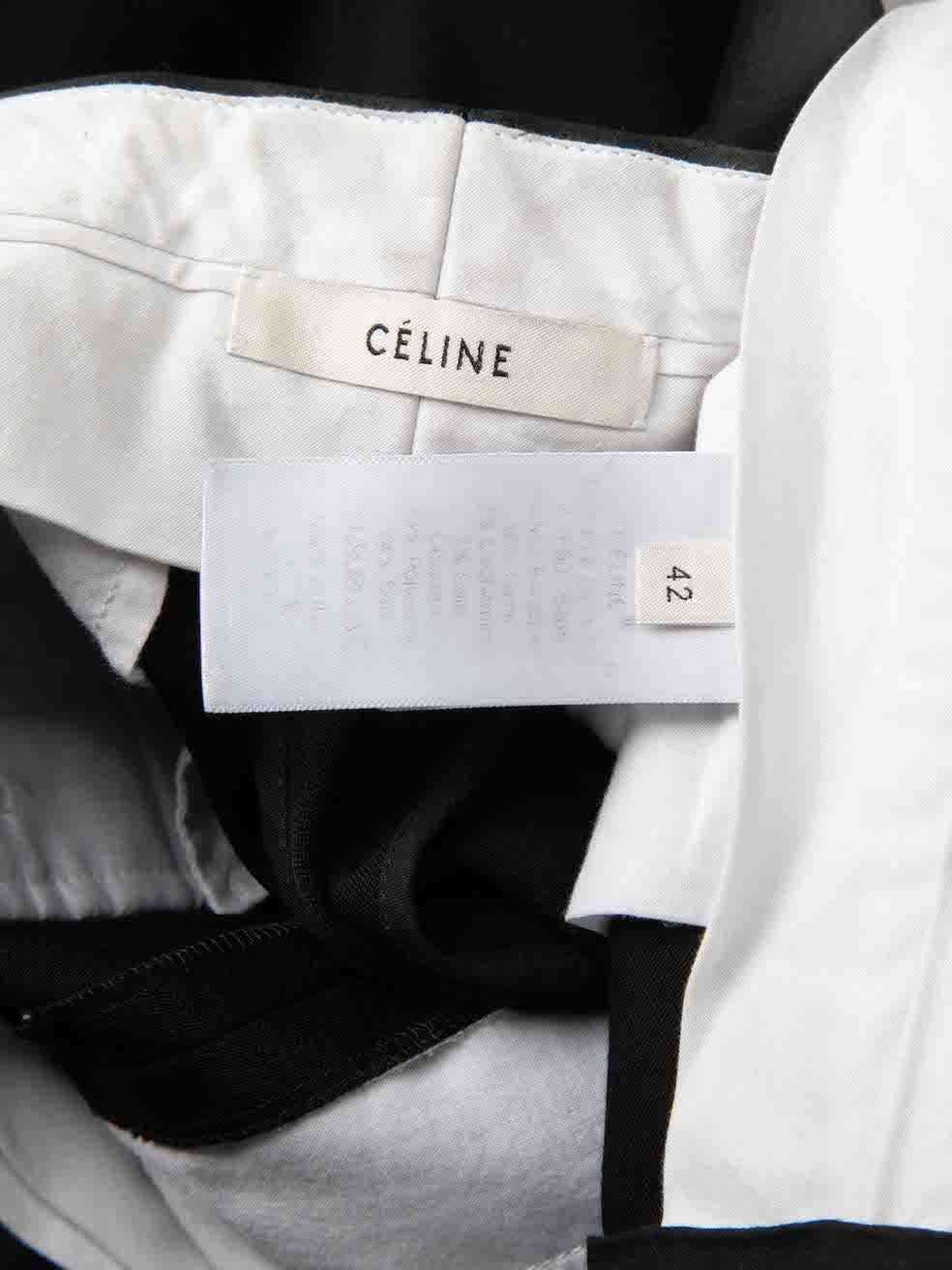 Pantalon fuselé à taille contrastée en laine noire Céline Taille XL en vente 4