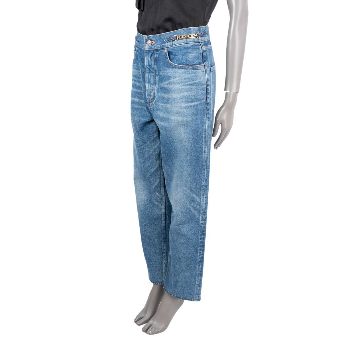 100% authentic Celine Margaret high waist jeans in blue cotton (100%). Feature a  CC gold chains on the side, rounded slit pockets on the front, two slit pockets on the back. Open with a zipper and one button in the front. Have been worn and are in