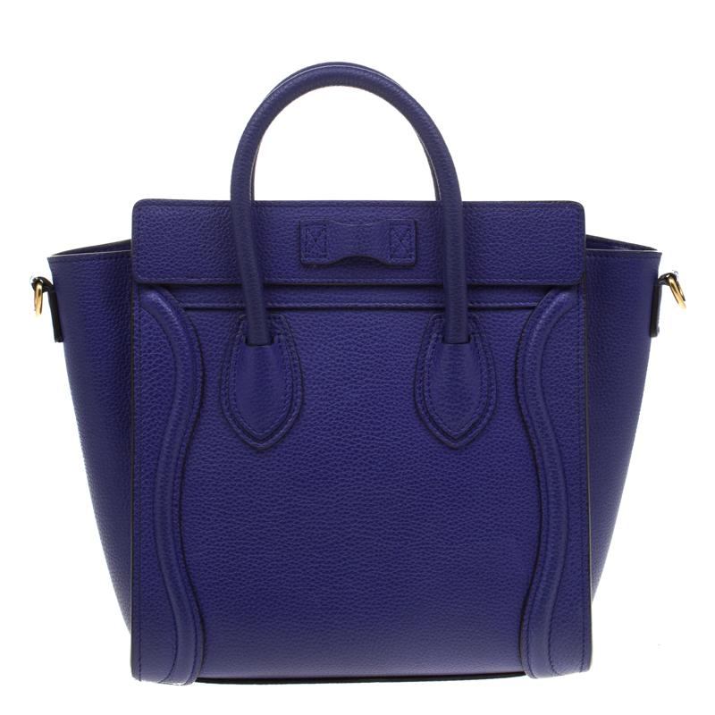 This lovely Nano Luggage tote from Celine is a popular design and is intricately designed with sheer perfection. Crafted from blue leather, the tote features signature flappy wings, dual top handles, a front zip pocket, and a detachable shoulder