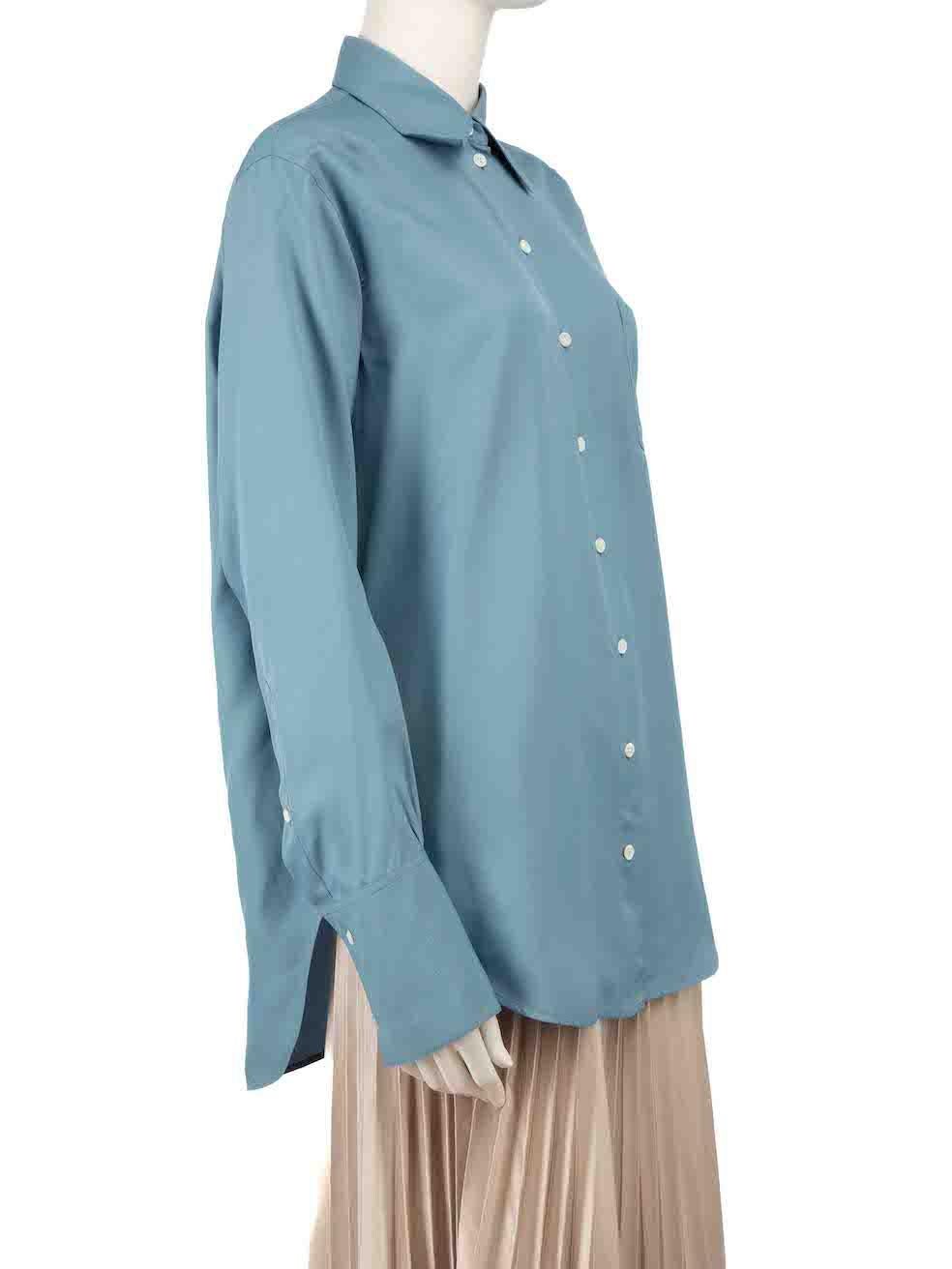 CONDITION is Very good. Minimal wear to shirt is evident. Minimal wear to the buttons at the front fastening and both cuffs with chips and cracks to the shell on this used Céline designer resale item.
 
 Details
 Blue
 Viscose
 Shirt
 Long sleeves
