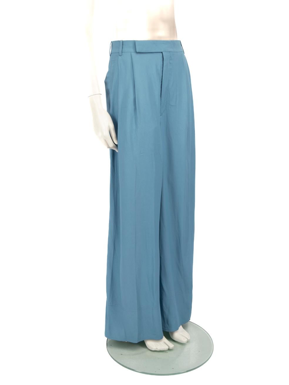 CONDITION is Very good. Minimal wear to trousers is evident. Light discolouration to the right waist lining and the brand label is partly detachedon this used Céline designer resale item.
 
 Details
 
 
 Blue
 
 Viscose
 
 Trousers
 
 Wide leg
 
