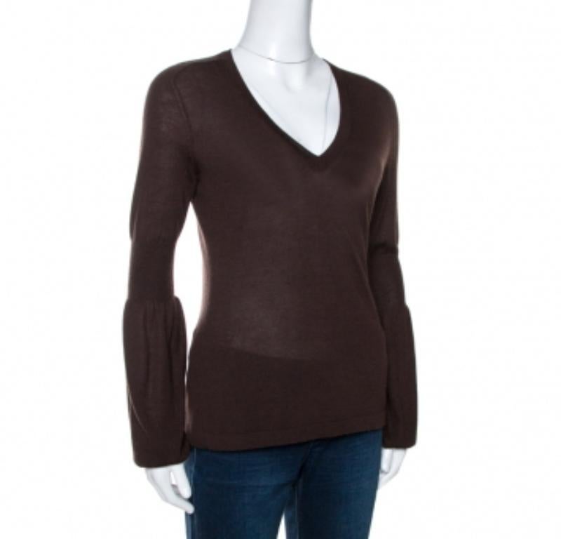 This is a classic top from Celine that has been made from cashmere. This sweet brown top exhibits a well-balanced combination of comfort and fashion in its design. It has long sleeves, a V neckline and a great fit.