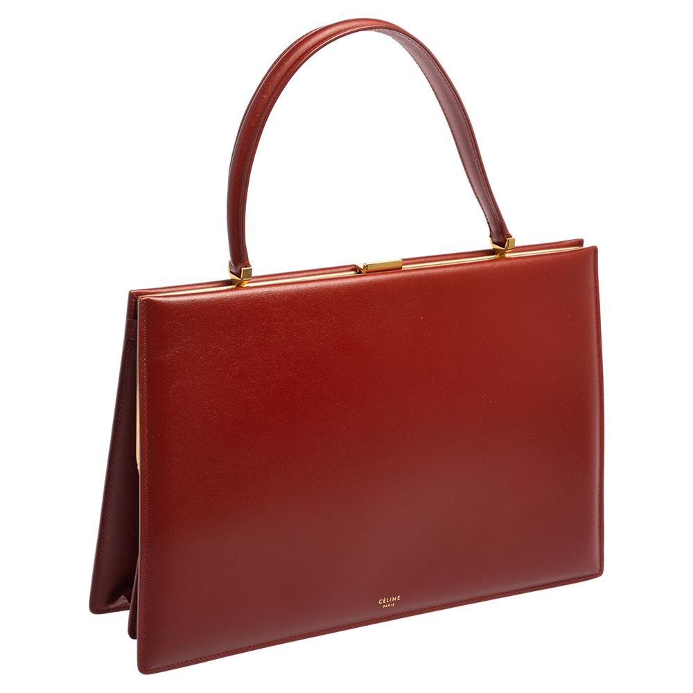 clasp top handbag