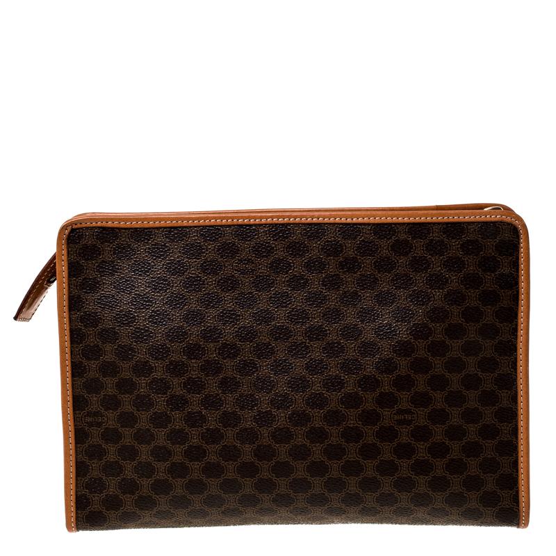 Crafted from Macadam leather, this clutch by Celine comes with a gold-tone detail on the front and a leather interior for your essentials. The clutch brings a lot of charm to accompany your evening outfits.

Includes: The Luxury Closet Packaging,