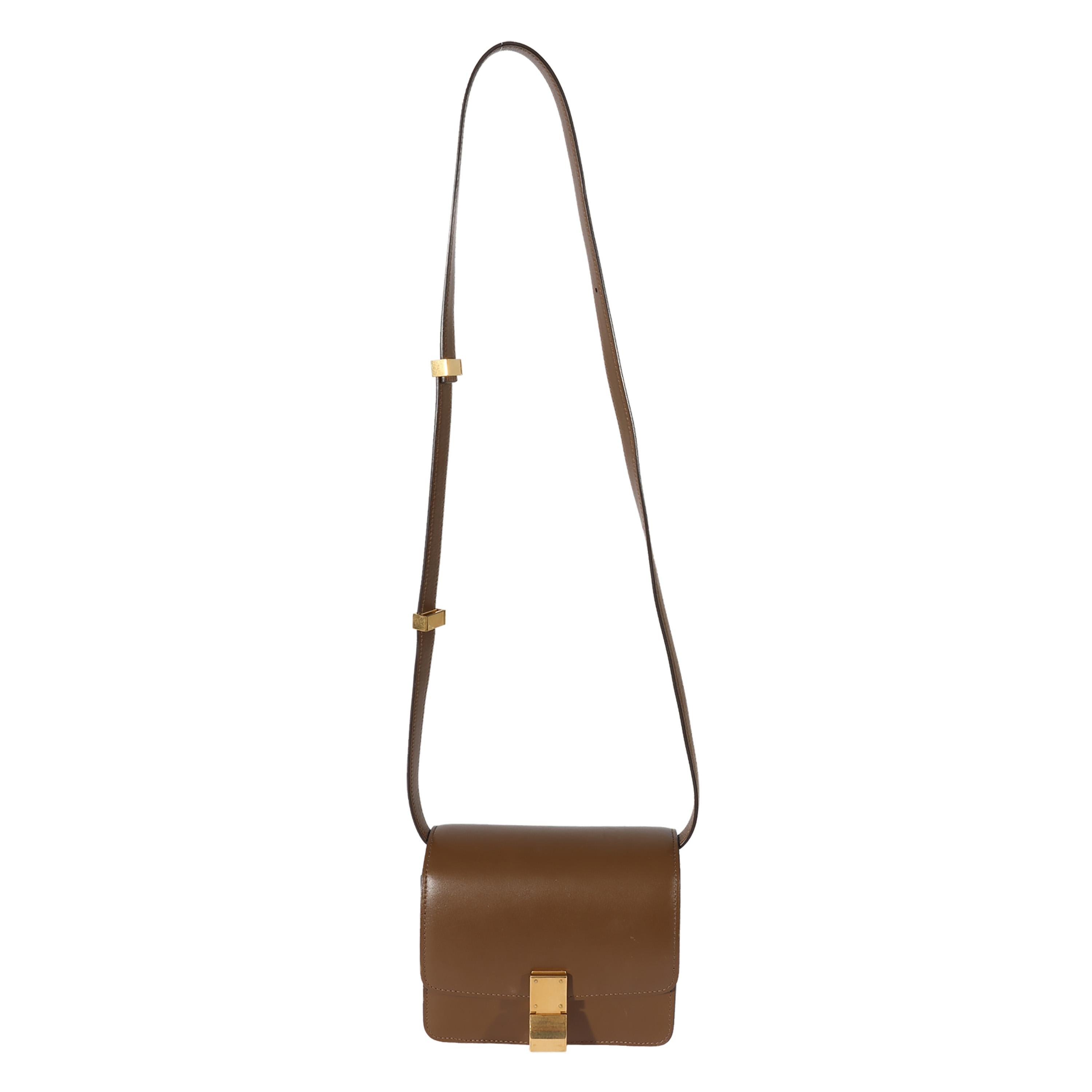 Listing Title: Celine Brown Smooth Leather Small Box Bag
SKU: 127817
Condition: Pre-owned 
Condition Description: Called the Classic for good reason, this box-shape bag is the brand's most recognizable bag. This signature style has an adjustable