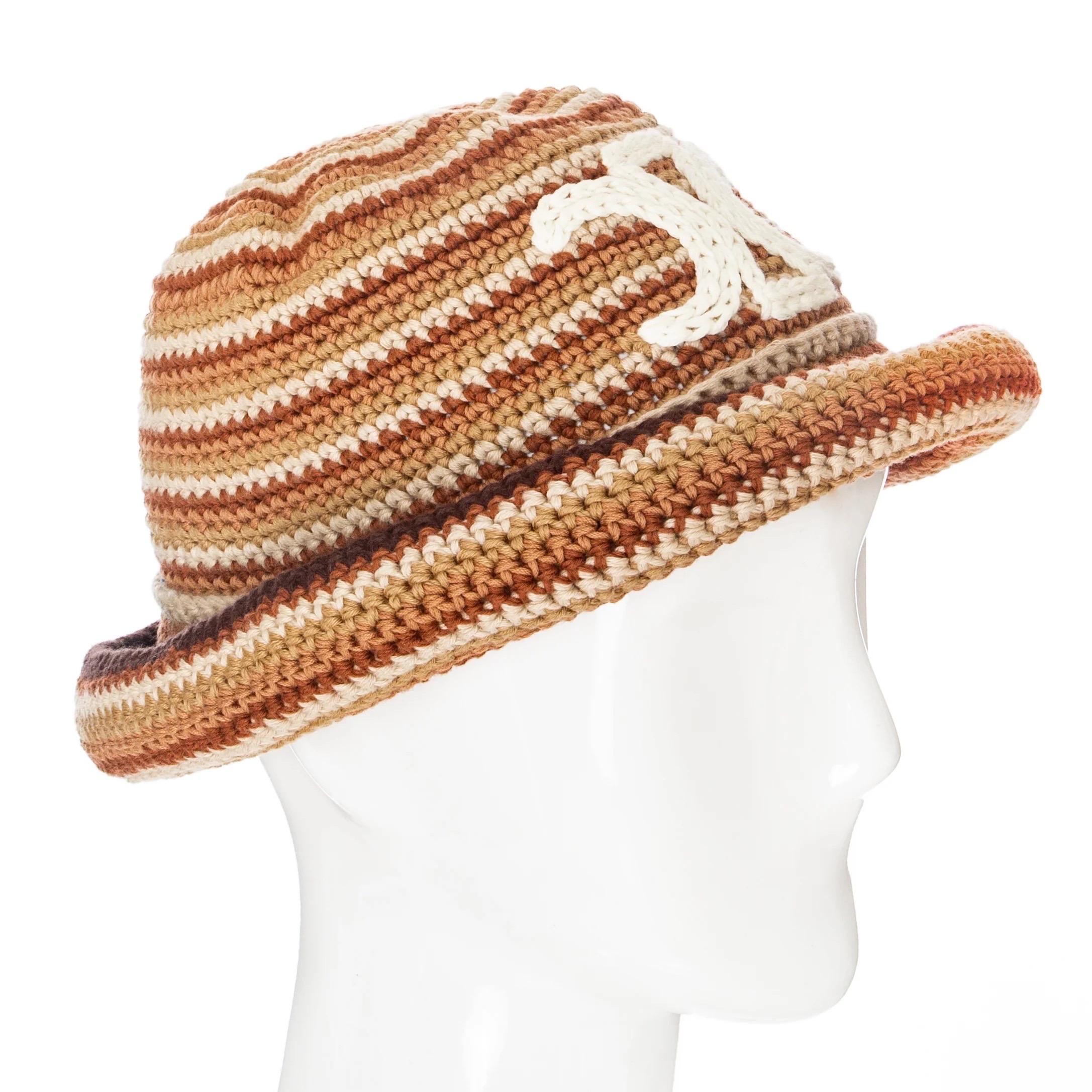 Celine Brown Striped Cotton Crochet Triomphe Bucket Hat 

Multicolored neutrals: brown, camel, tan, cream, ivory
Crocheted
Bucket, cloche style
Rolled brim
Triomphe front detail
Made in Italy
100% cotton
Great preowned condition; fasten off stitch