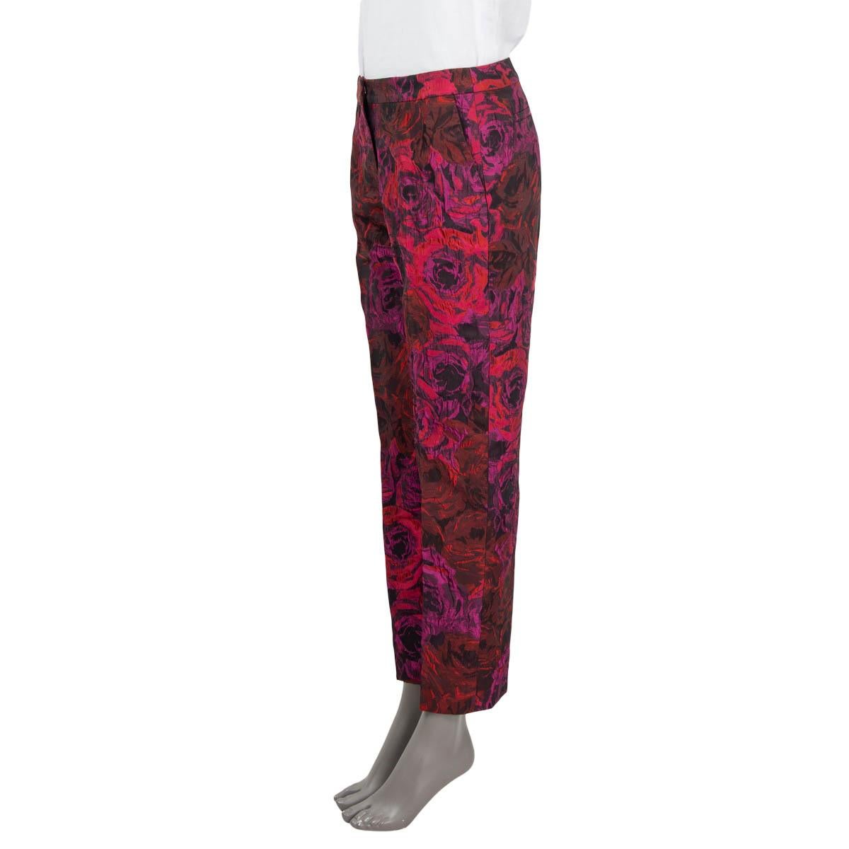 100% authentic Dries Van Noten jacquard pleated pants in burgundy, red, purple and black acetate (55%), polyester (41%) and nylon (4%). Feature two side slit pockets and two sewn shut slit pockets on the back. Open with a concealed button, zipper