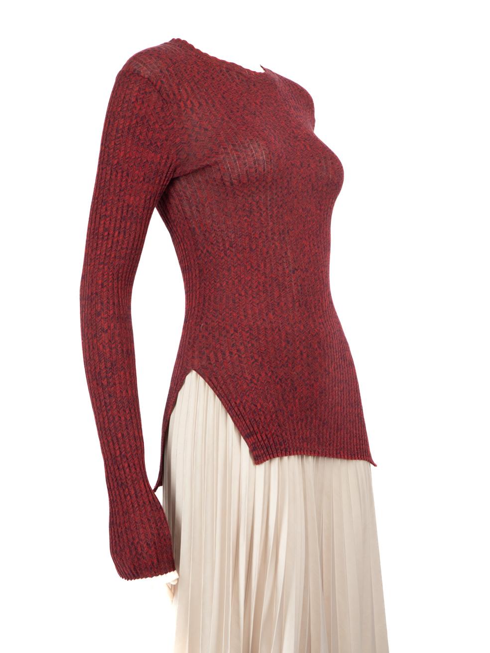 CONDITION is Very good. Hardly any visible wear to the top is evident on this used Céline designer resale item.
 
 Details
 Burgundy
 Cotton
 Ribbed knit top
 Figure hugging fit
 Stretchy
 Long sleeves
 Round neck
 Side slits
 
 
 Made in China
 
