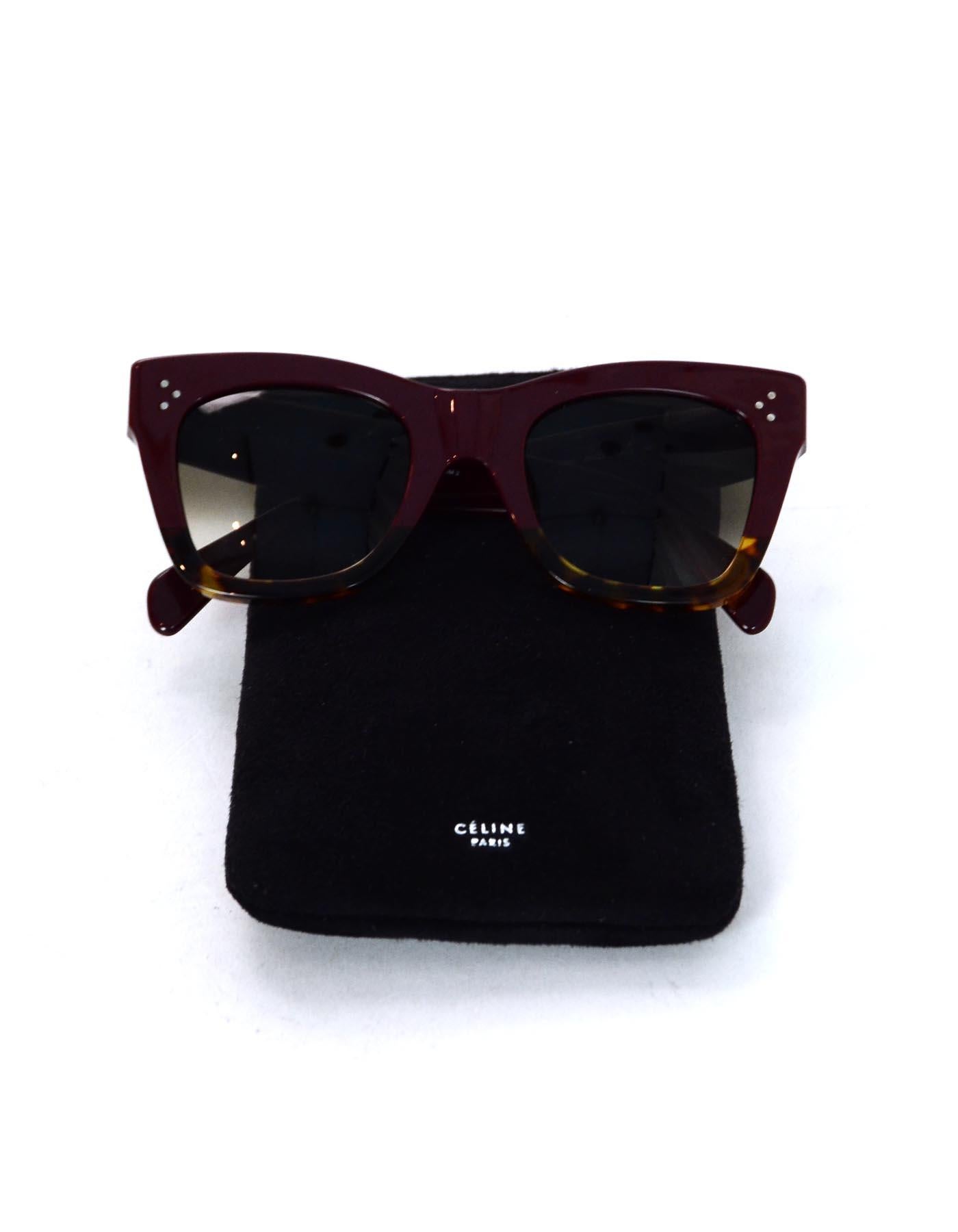 Celine Burgundy/Tortoise Catherine Sunglasses

Made In:  Italy
Color: Burgundy, tortoise 
Hardware: Silvertone
Materials: Resin
Overall Condition: Excellent pre-owned condition 
Estimated Retail: $350 + tax
Includes:  Celine case and cleaning cloth