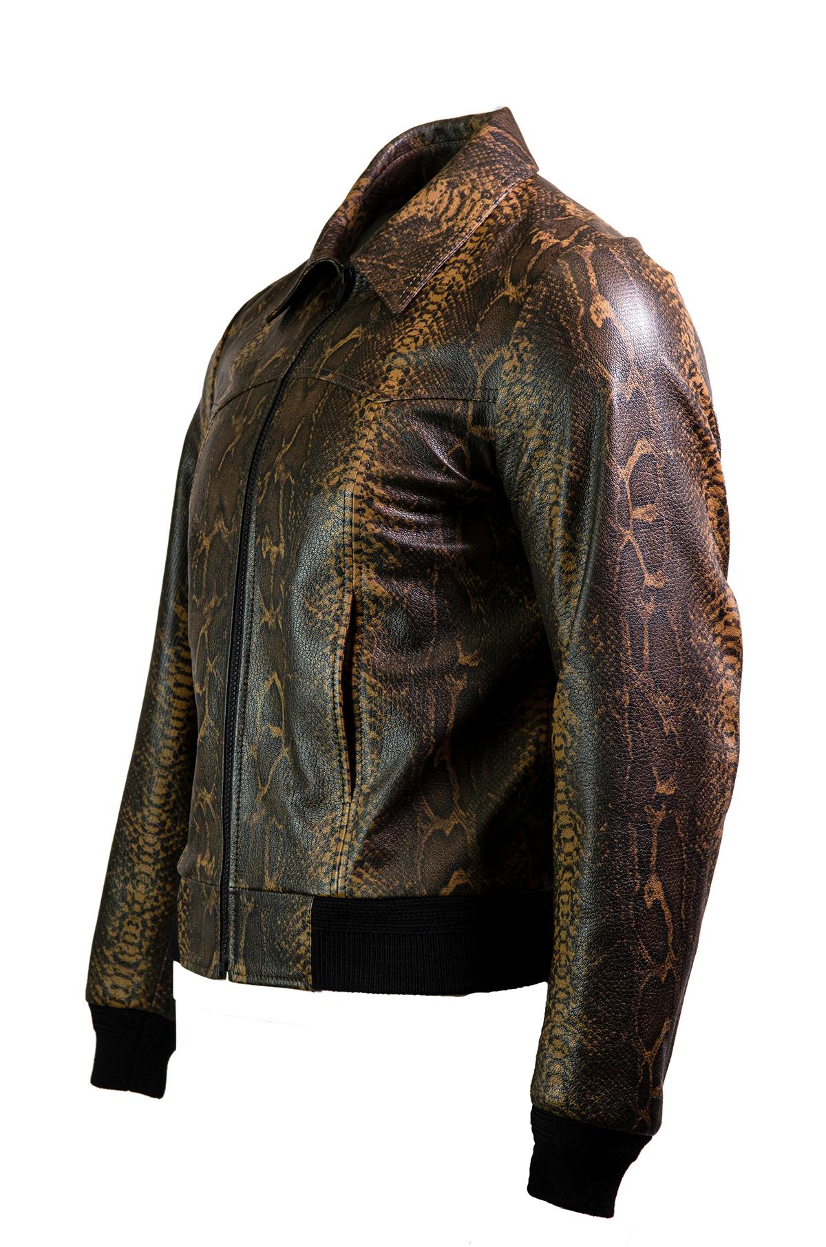 Outstanding rare leather blouson by Celine from their F/W 2019 collection. This brown snakeskin print jacket is a variation of the runway look 24 - the runway version with epaulettes was never produced .

This unique western style snake-print jacket