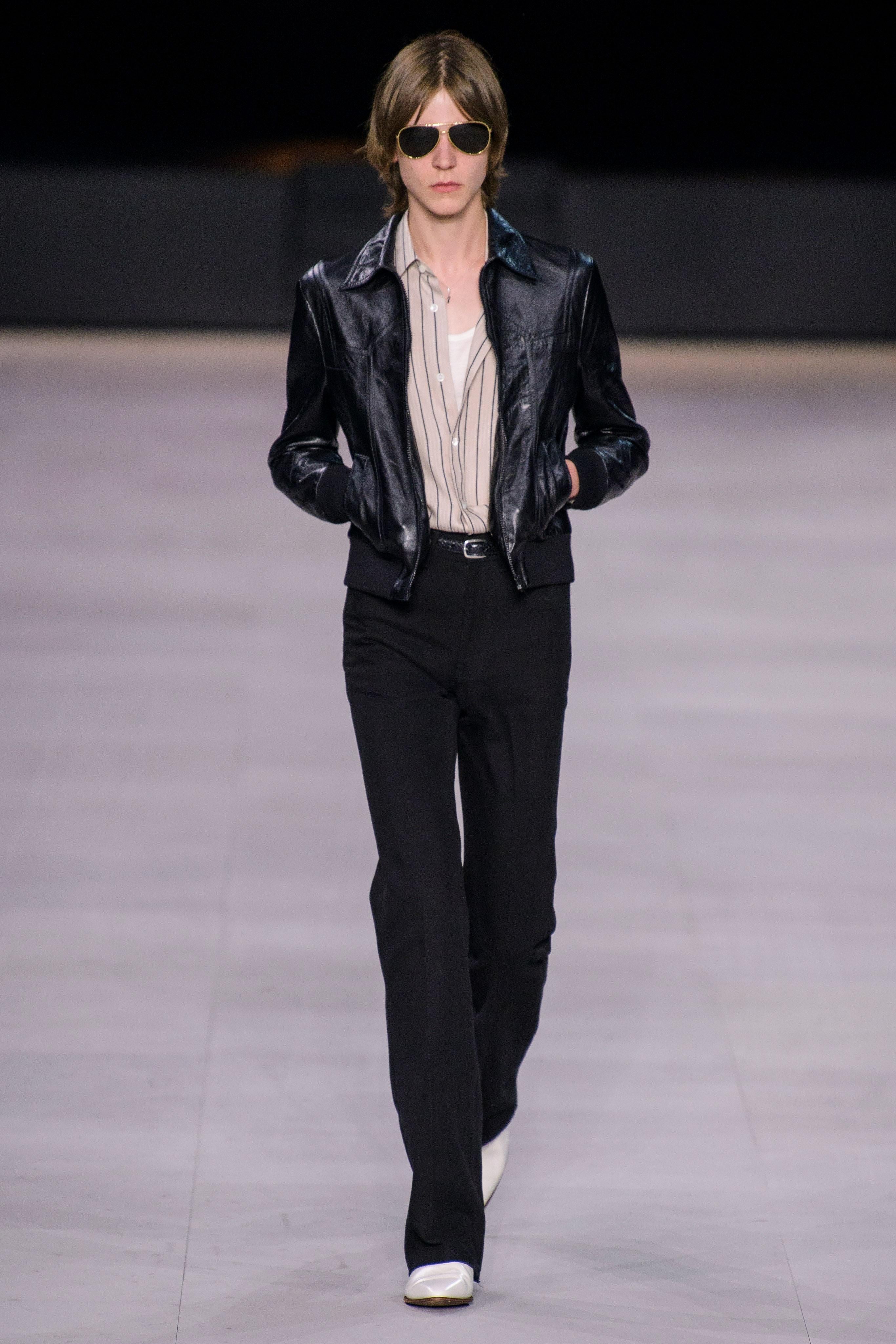 Striking black lamb leather bomber jacket by Celine from their Spring Summer 2020 collection. This piece was look number 46 on the runway.

This western style leather blouson is a classic wardrobe staple - short at the waist and with a fitted