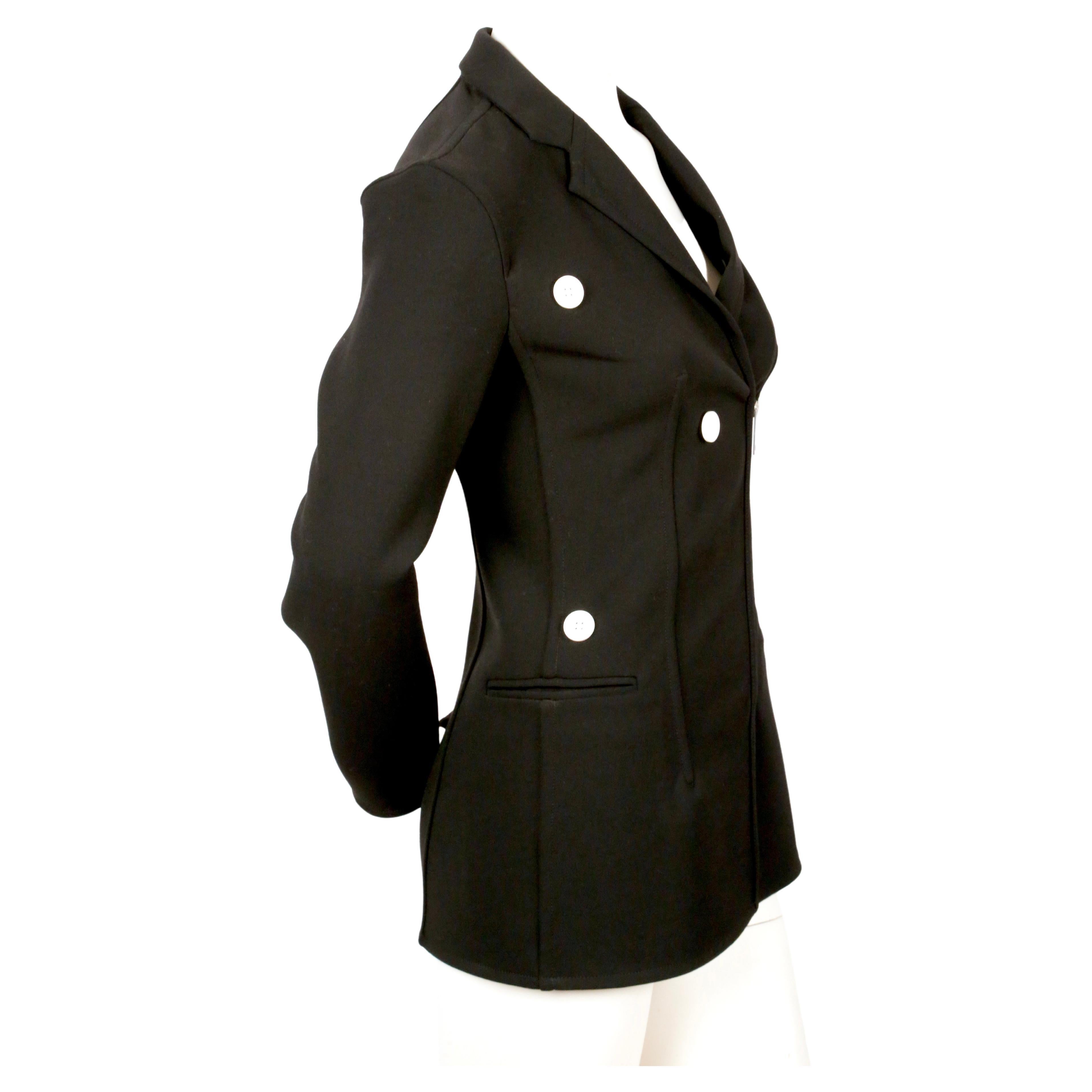 Jet-black, stretch wool jacket with exposed silver zipper and white buttons designed by Phoebe Philo for Celine exactly as seen on the spring 2016 runway. French size 36. Approximate measurements (unstretched): shoulder 16