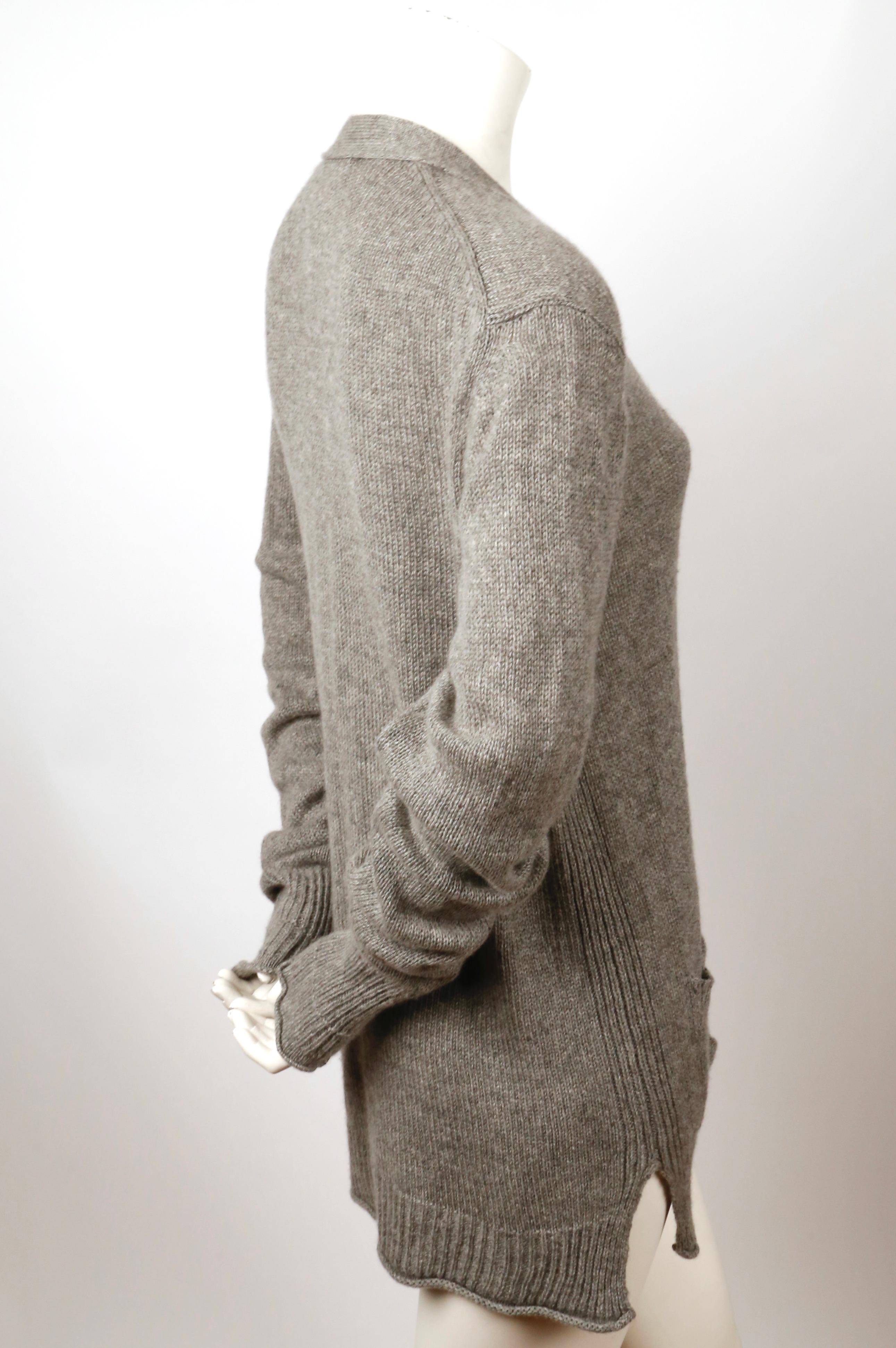 Heathered-grey, cashmere cardigan designed by Phoebe Philo for Celine. Lightweight knit.  Size 'M'.  Approximate measurements: (unstretched): shoulders 16
