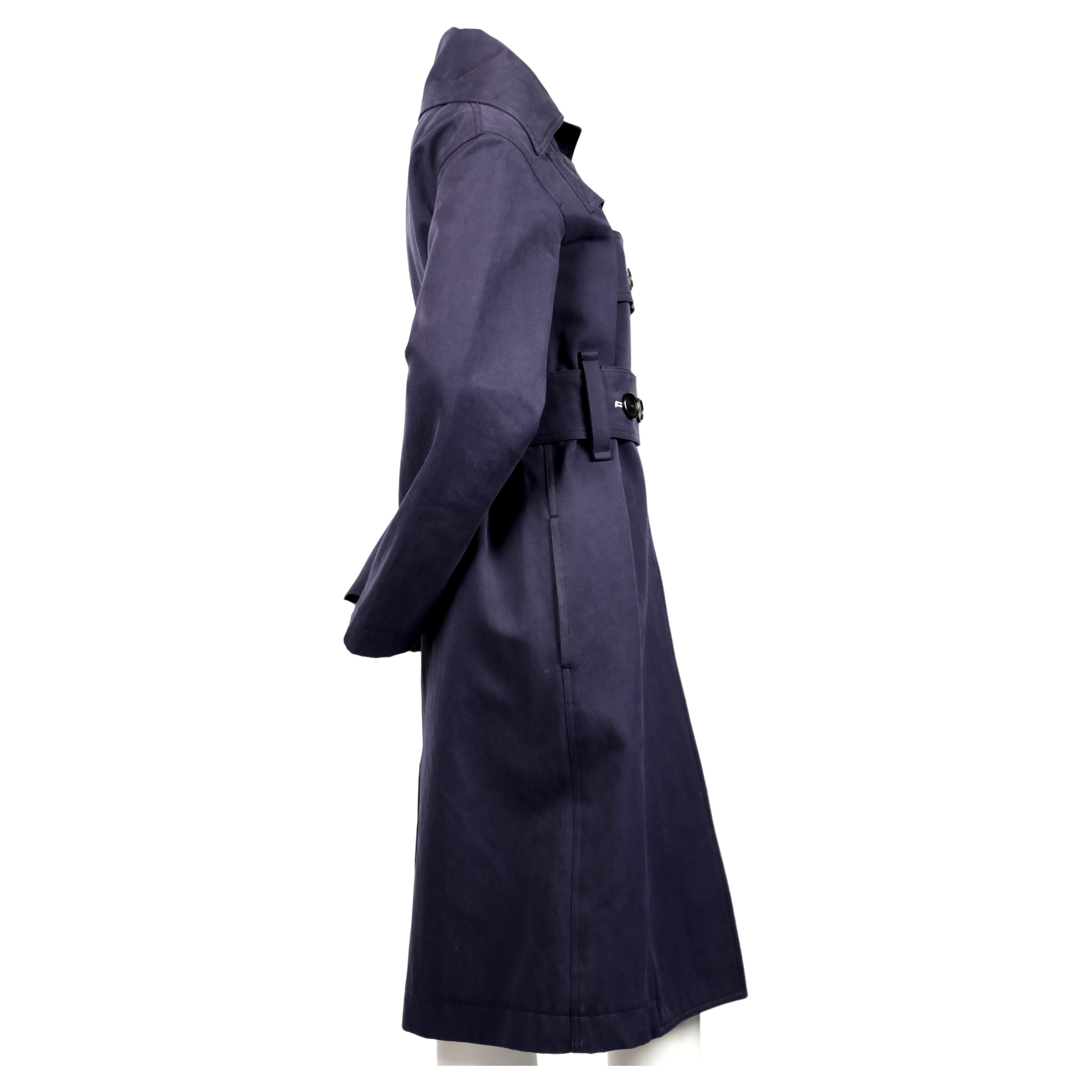 Navy-blue, brushed-cotton, trench coat with unique button closure designed by Phoebe Philo. French size 38. Approximate measurements: drop shoulder 19