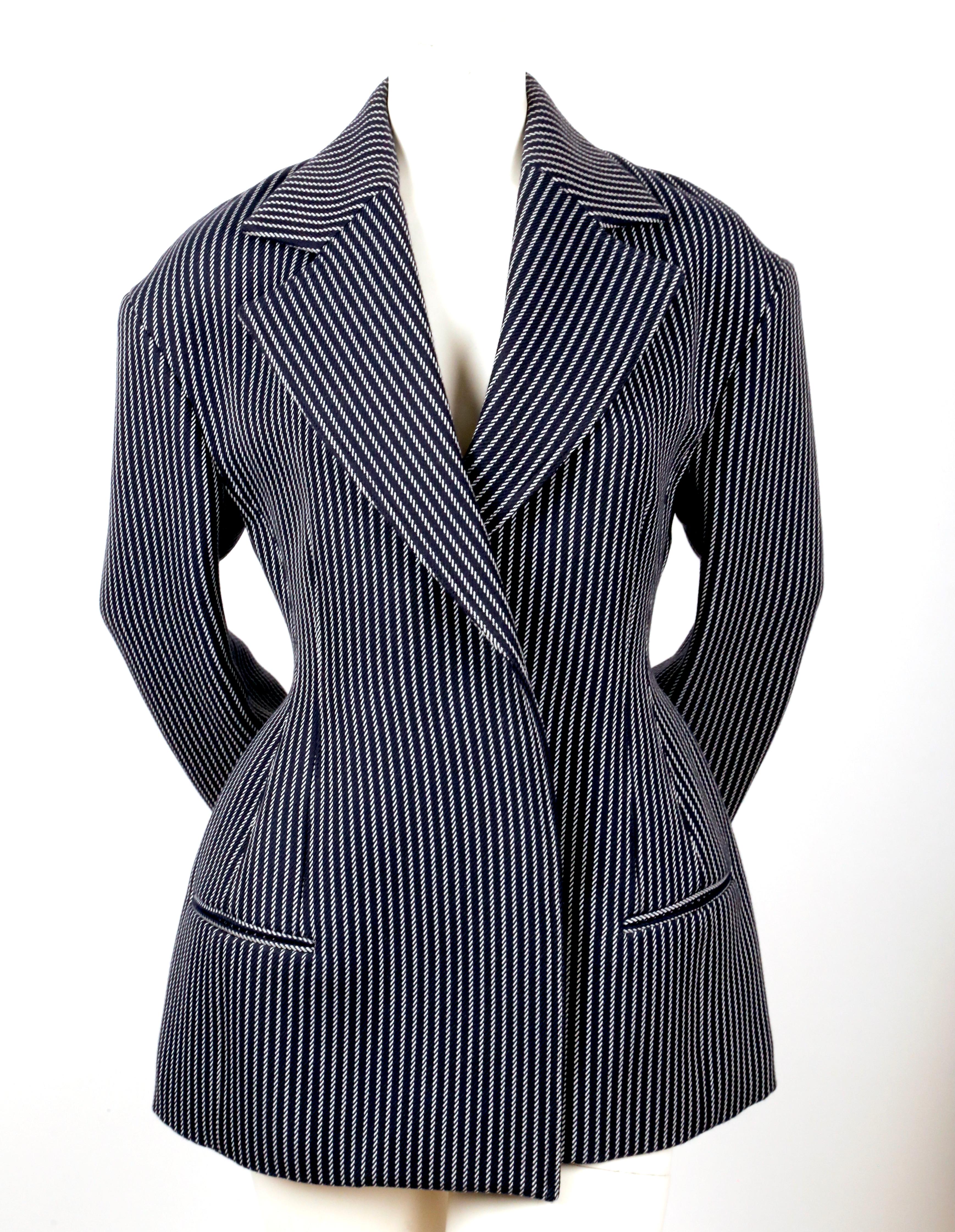 Navy blue and white, hourglass shaped jacket with open closure designed by Phoebe Philo for Celine dating to resort of 2016. French size 36. Approximate measurements (when overlapped) : drop shoulder 21