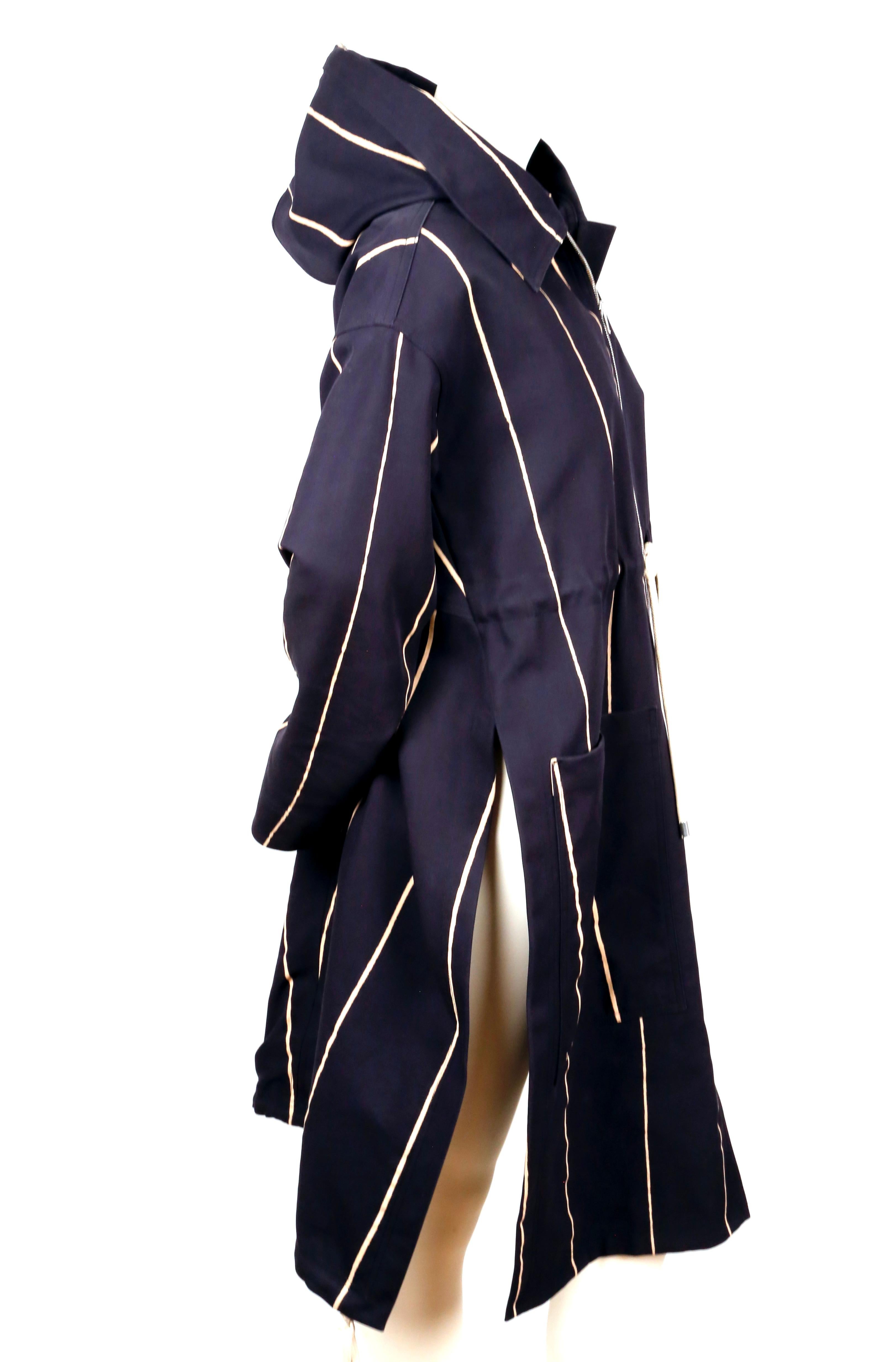Oversized navy and off-white striped coat with hood designed by Phoebe Philo for Celine dating to resort of 2016. French size 34 however this coat has a very oversized fit. Approximate measurements: drop shoulder 22