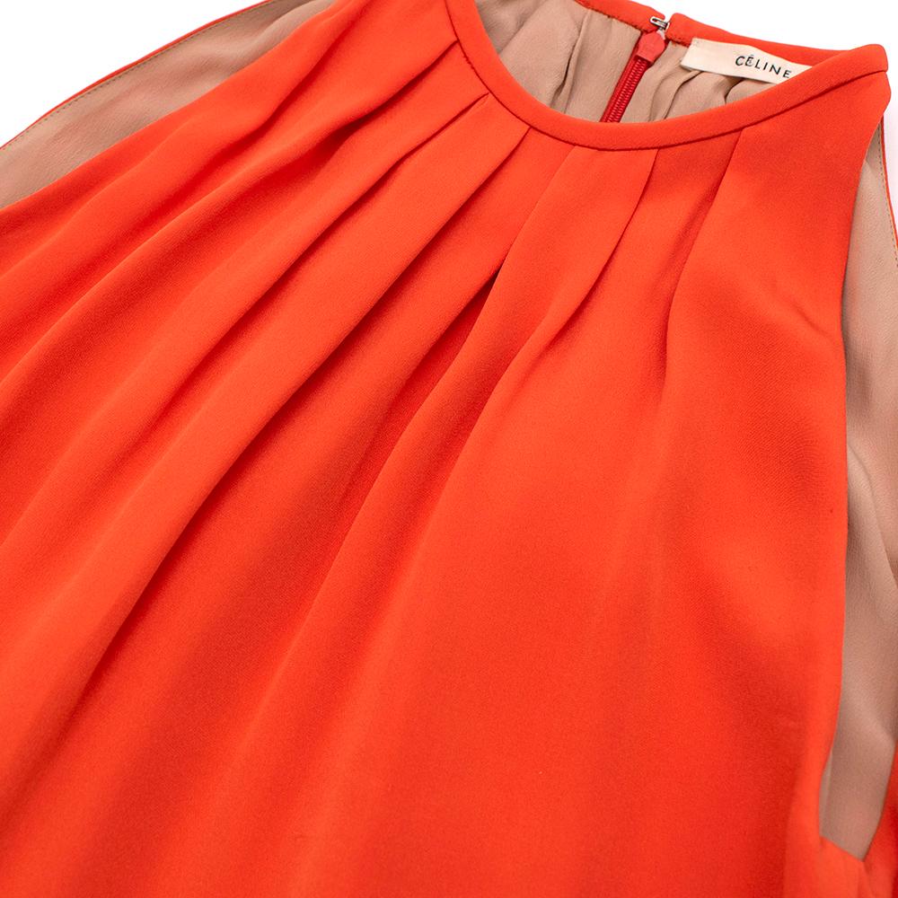 Celine Orange Silk Pleated Mini Dress

- Celine by Phoebe Philo 
- Made of luxurious soft silk 
- Classic cut 
- Pleated details to the neckline 
- Round neck 
- Mini length 
- Pockets to the sides 
- Zip fastening to the back 
- Fully lined 
-