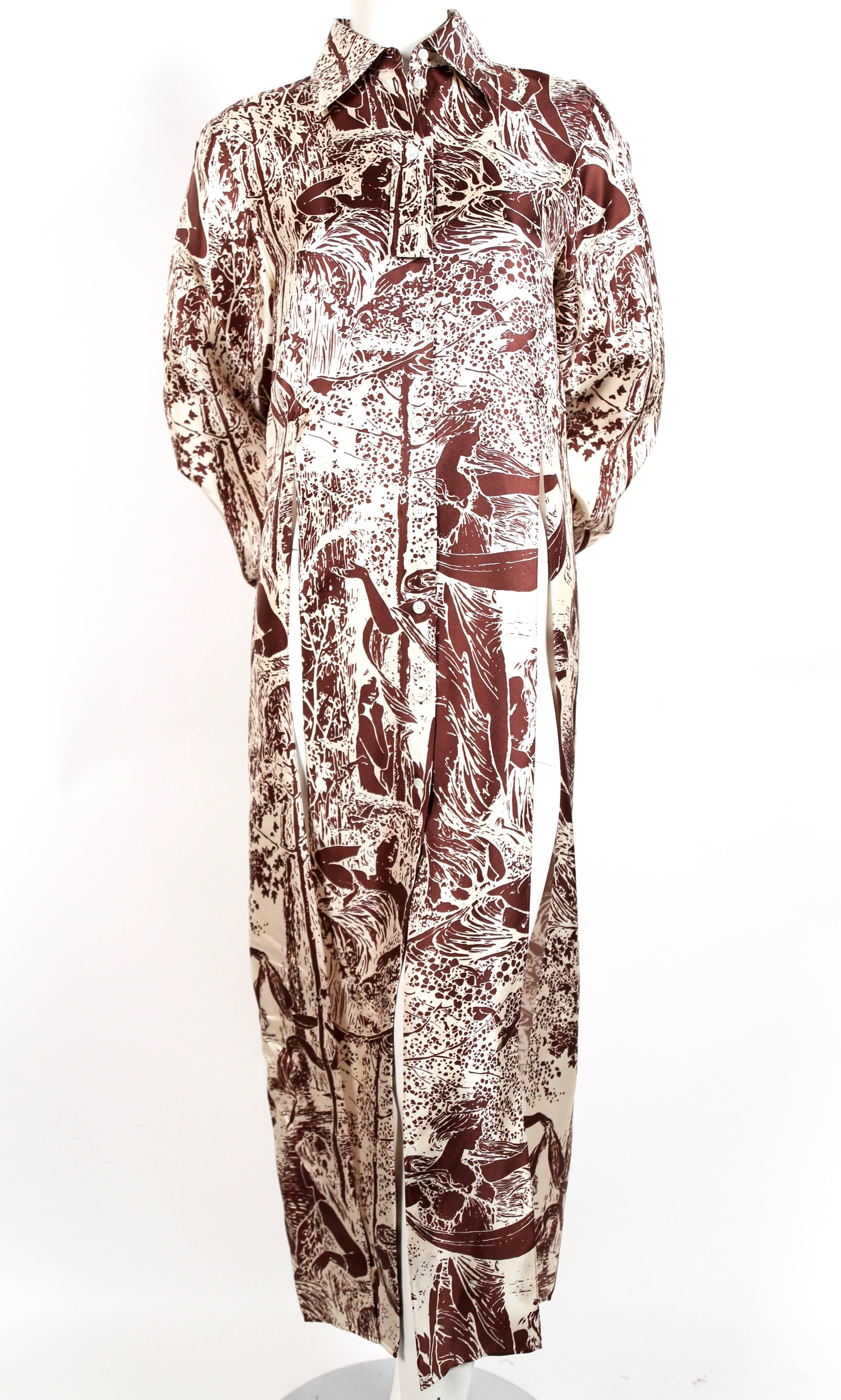 Brown and off-white printed silk dress with large slits at front sides and back designed by Phoebe Philo for Celine exactly as seen on the fall 2017/2018 runway. French size 38. Approximate measurements: shoulder 16