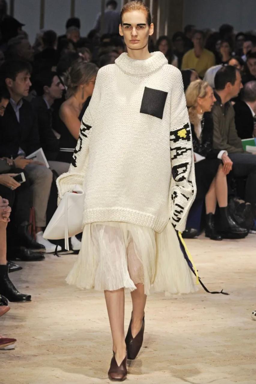 - Spring/Summer 2014 Céline Runway collection by Phoebe Philo

- Sold by Mae Vintage London

- Fitted high waist with a linen gauze roughly pleated skirt with a raw hem

