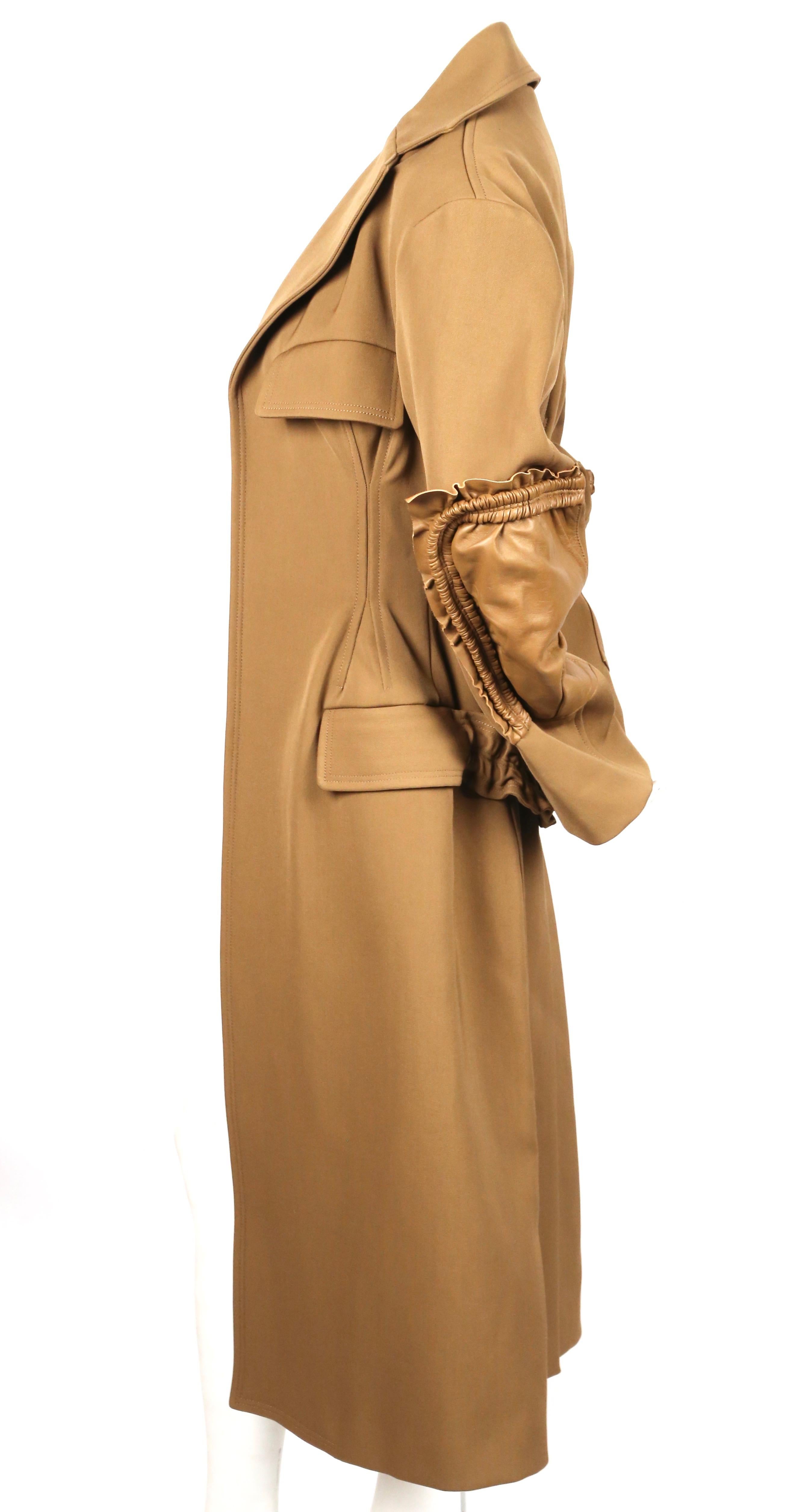 Dark-tan, long, gabardine coat with ruffled leather elbow patches, ruched half-belt and Open closure designed by Phoebe Philo exactly as seen on the spring 2017 runway. French size 34.  Approximate measurements: drop shoulder 18