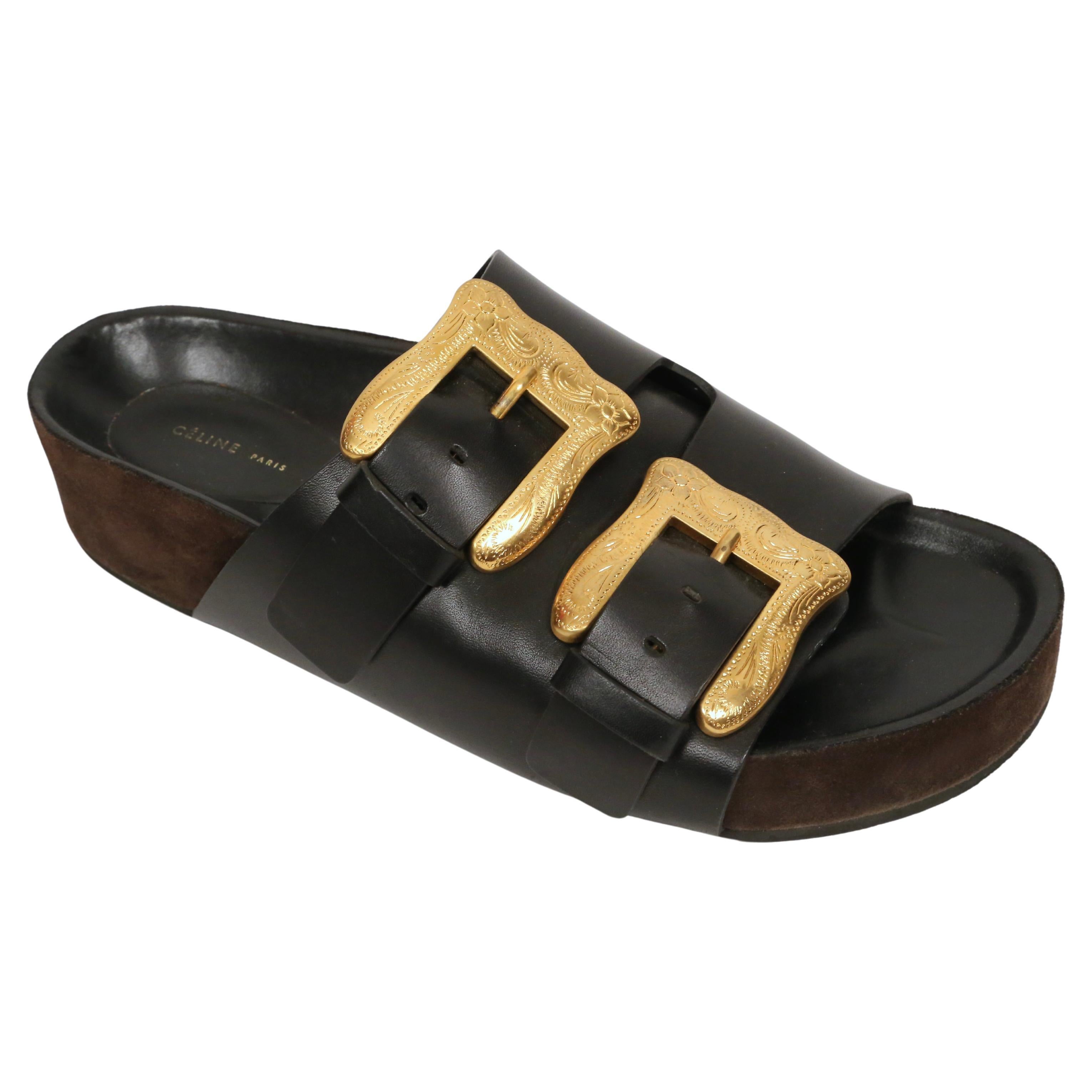 Very well documented 'boxy western' sandals with oversized gilt buckles designed by Phoebe Philo for Celine dating to summer of 2015. Featured in numerous editorials.

Size 41 (please know your size). 

Made in Italy.

Original box with