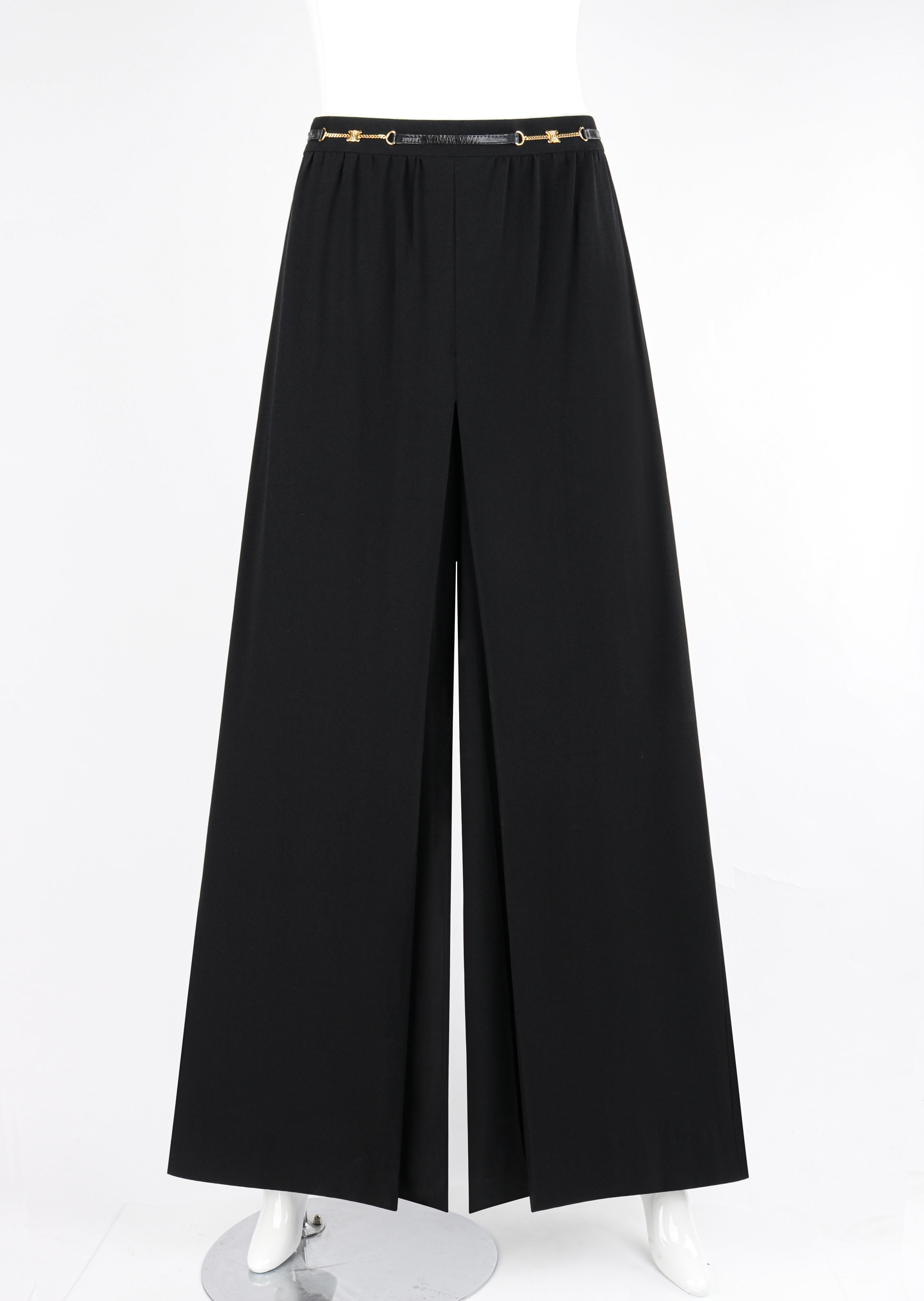 Celine c.1980's/90's Black Gold Logo Chain Accent Ultra Wide Leg Pleated Trousers

Brand / Manufacturer: Celine
Circa: 1980's/1990's
Label(s): 