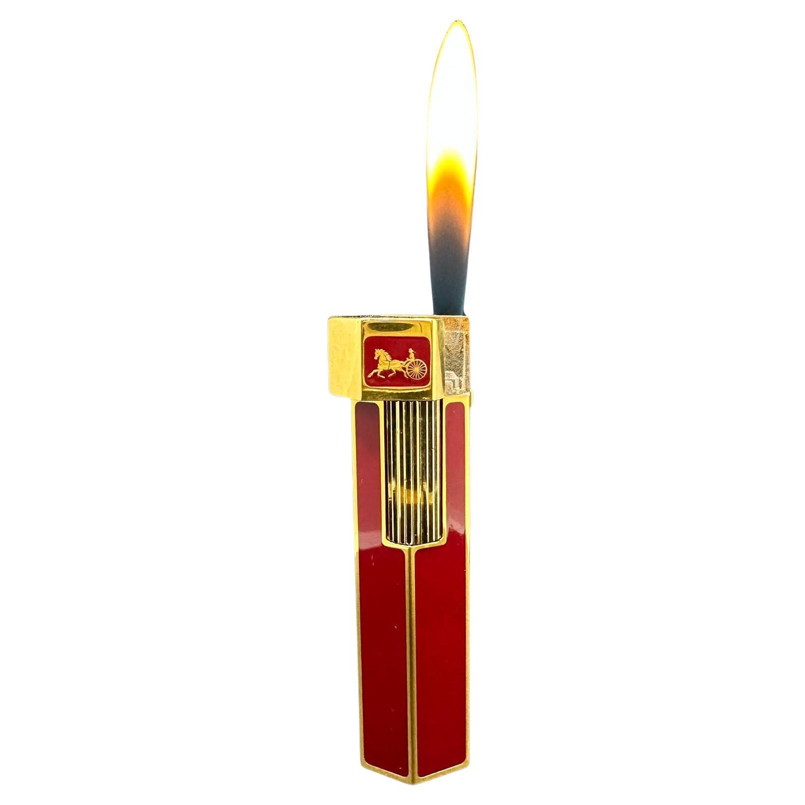 Celine Circa 1980s Hexagonal Hot Red Lacquer & Gold Vintage Lighter, Rare Retro
Celine hexagonal lighter, Hot Red and Gold Plated  
Vintage
1980s
Rare mint condition. 
CELINE Red Lacquer lighter original vintage 1980 Gold plated, exagonal shape