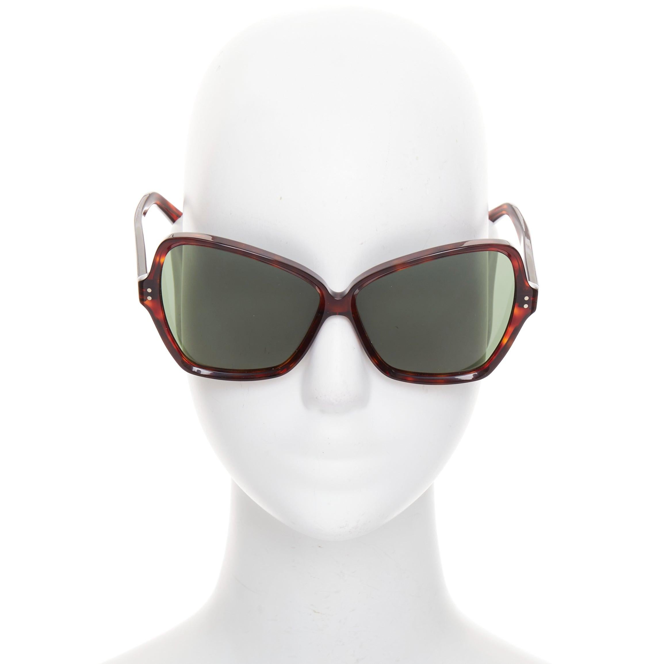 CELINE CL400641 brown tortoise oversized butterfly square sunglasses
Reference: AAWC/A01597
Brand: Celine
Designer: Hedi Slimane
Model: CL400641
Material: Acetate, Plastic
Color: Brown, Turquoise
Pattern: Marble
Closure: Slip On
Extra Details: Brown
