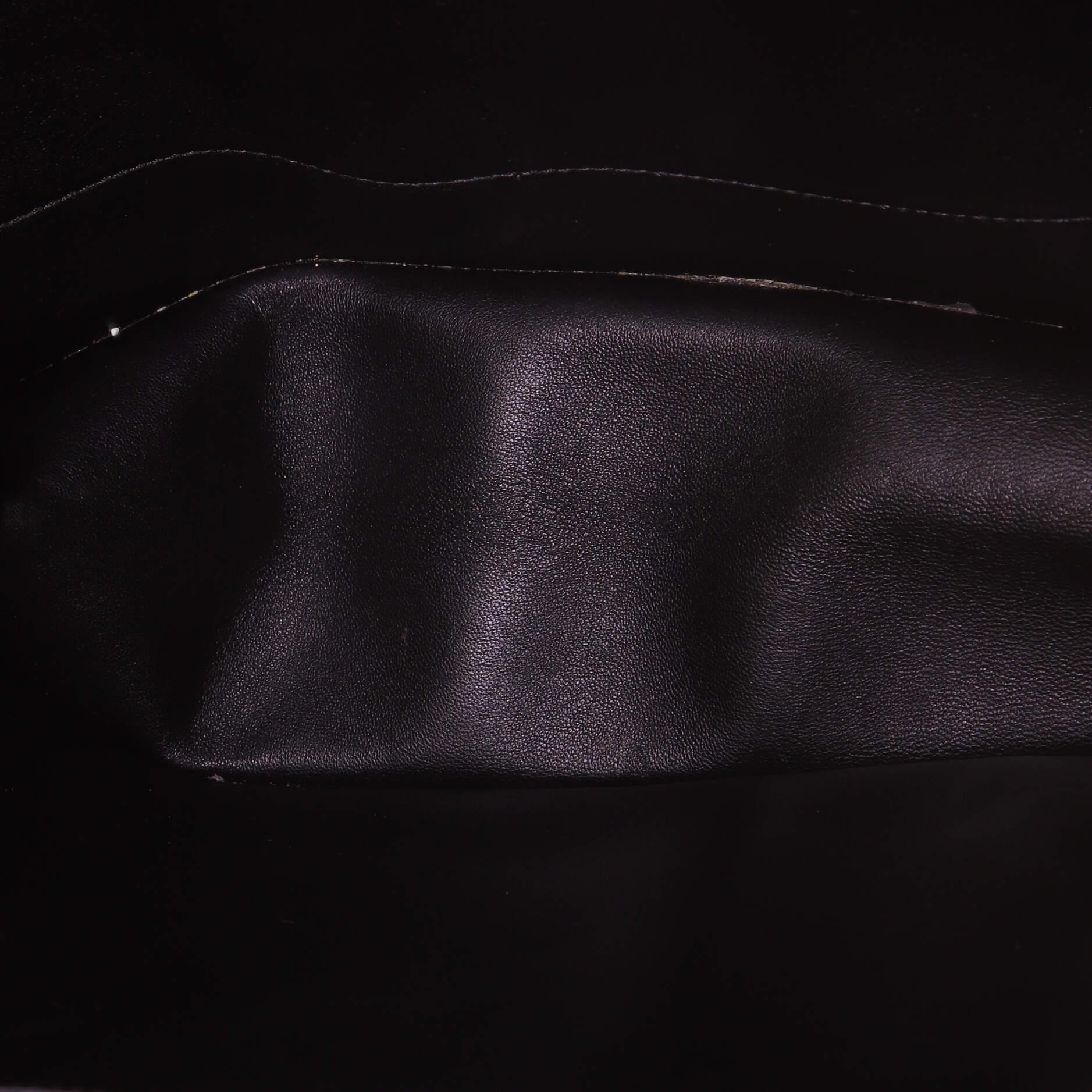 Condition: Good. Wear, creasing and heavy scuffs on exterior, indentations on rear, wear and creasing on handles. Splitting on handle wax edges, bubbling, wear, marks in interior, scratches and tarnish on hardware.
Accessories: No