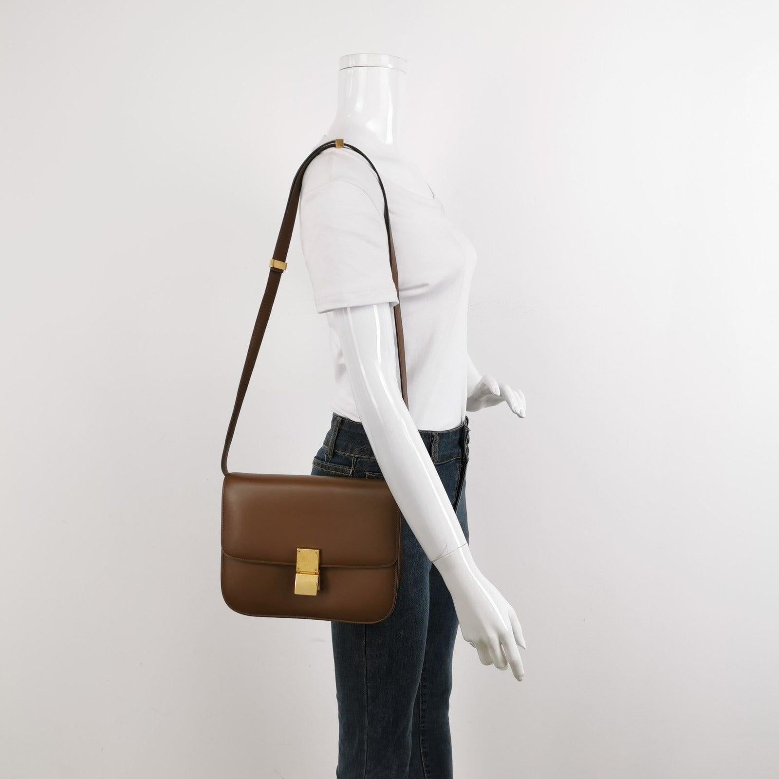 CELINE Classic Box Flap Caramel Brown Leather crossbody bag
  These are professional photos of the actual bag.
  This CELINE Classic Flap Box Leather crossbody bag has a perpetually stylish design and roomy and easy-to-organise interior for everyday