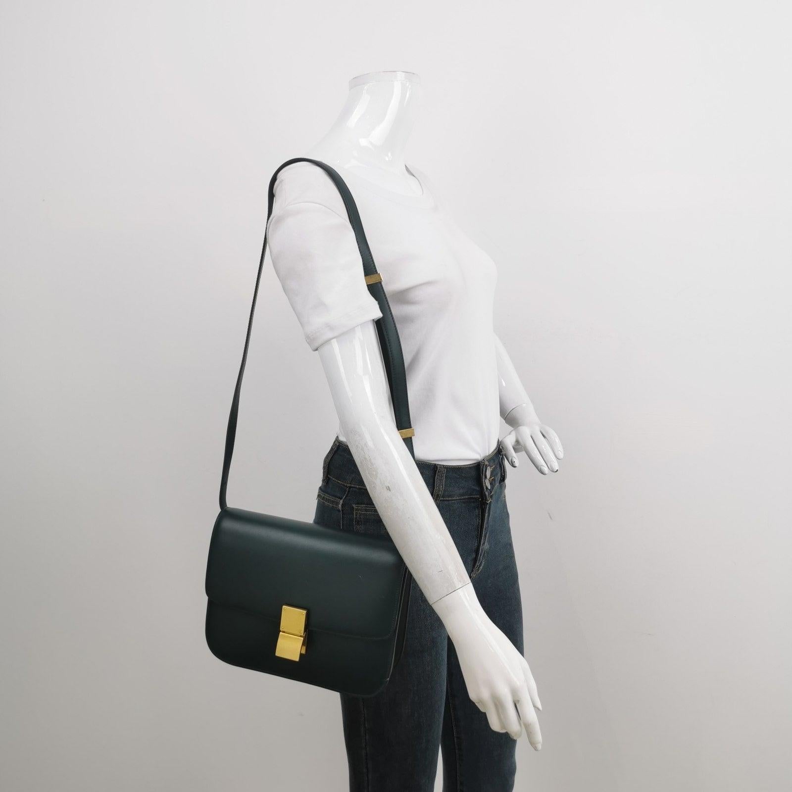 CELINE Classic Box Flap Dark Green Leather crossbody bag These are professional photos of the actual bag offered by Luxbags. This CELINE Classic Flap Grey Box Leather crossbody bag has a perpetually stylish design and roomy and easy-to-organise