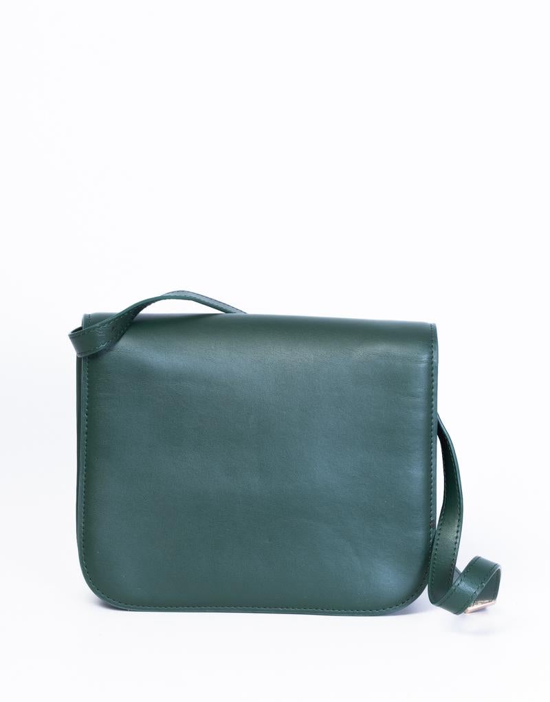 This shoulder bag is made of smooth calfskin leather in dark green. Featuring an adjustable leather shoulder strap and a frontal gold press-lock, a partitioned green leather interior with a zip compartment and patch pockets.

COLOR: Green
MATERIAL: